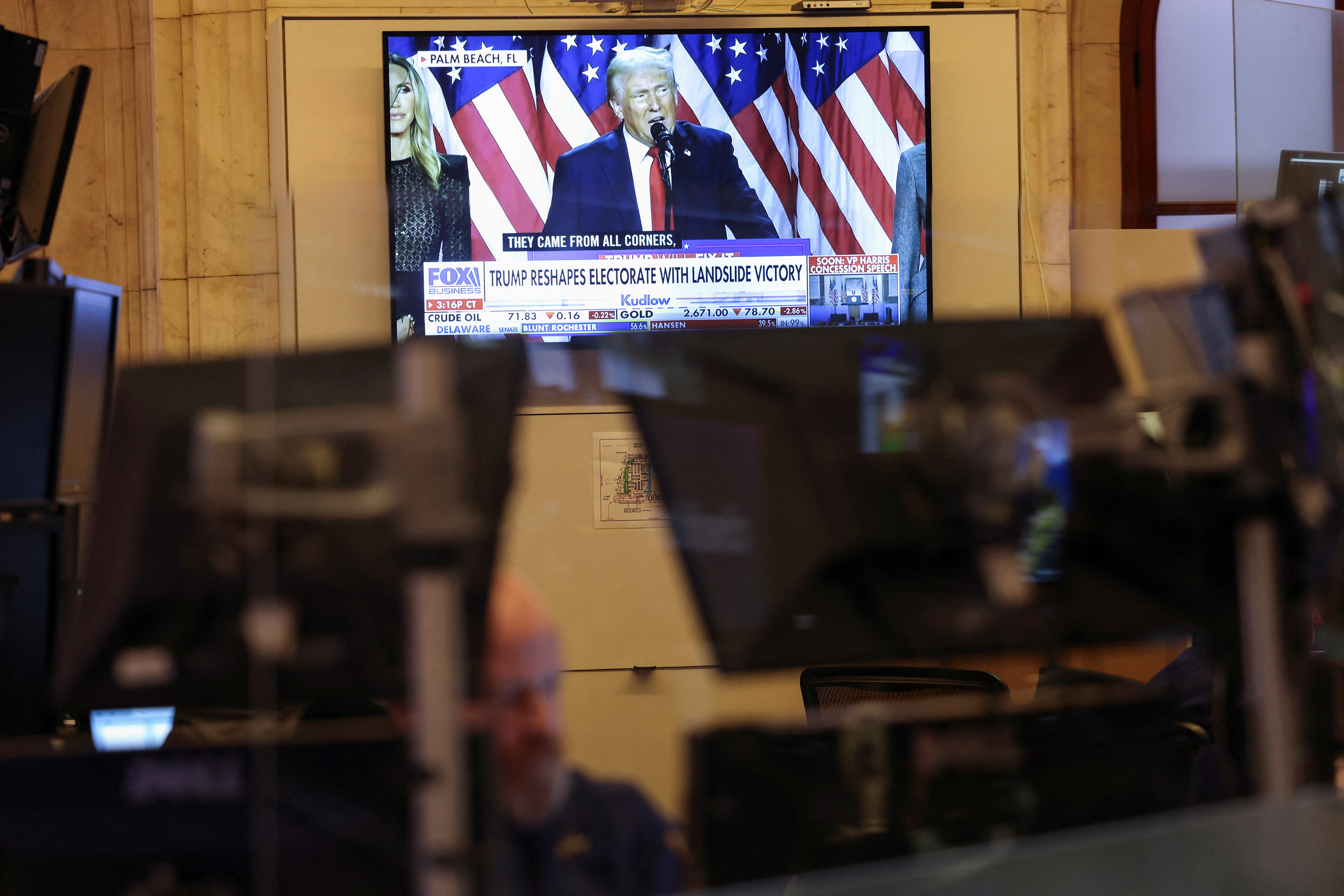 Traders work on NYSE floor