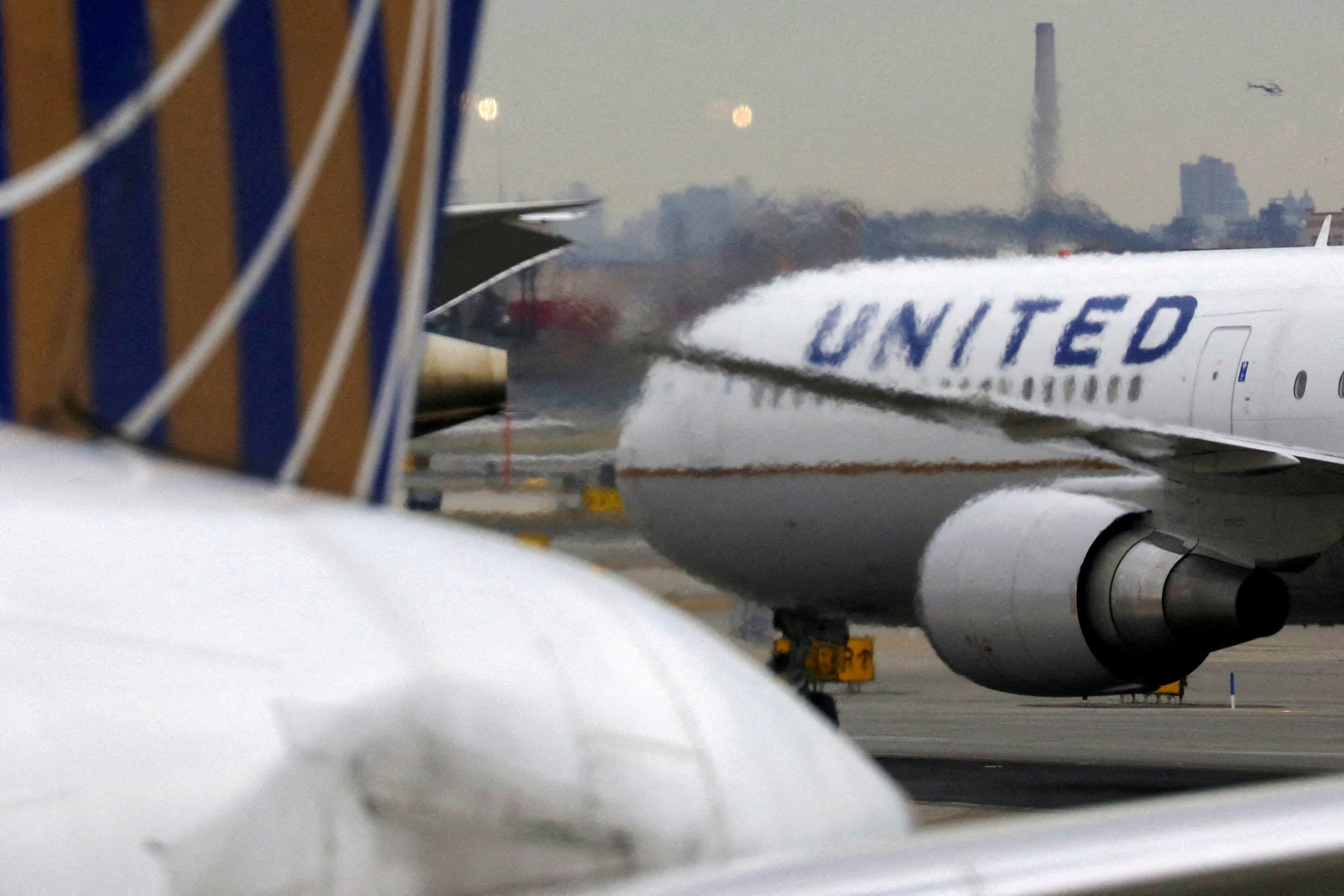 A United Airlines passenger jet taxis at Newark Liberty International Airport, New Jersey, U.S.