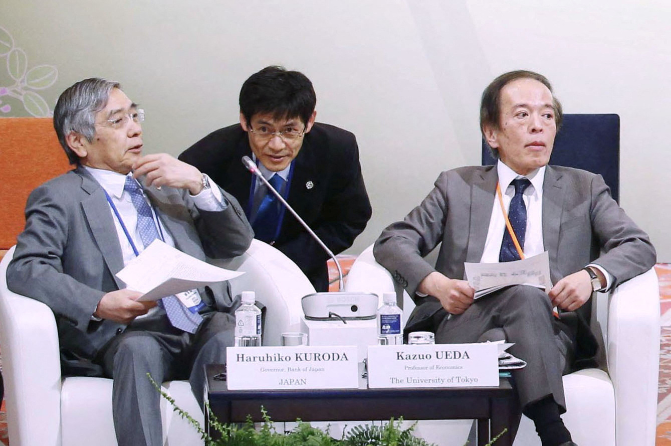 Bank of Japan Governor Kuroda and Ueda, a member of the central bank's policy board, attend a symposium in Sendai