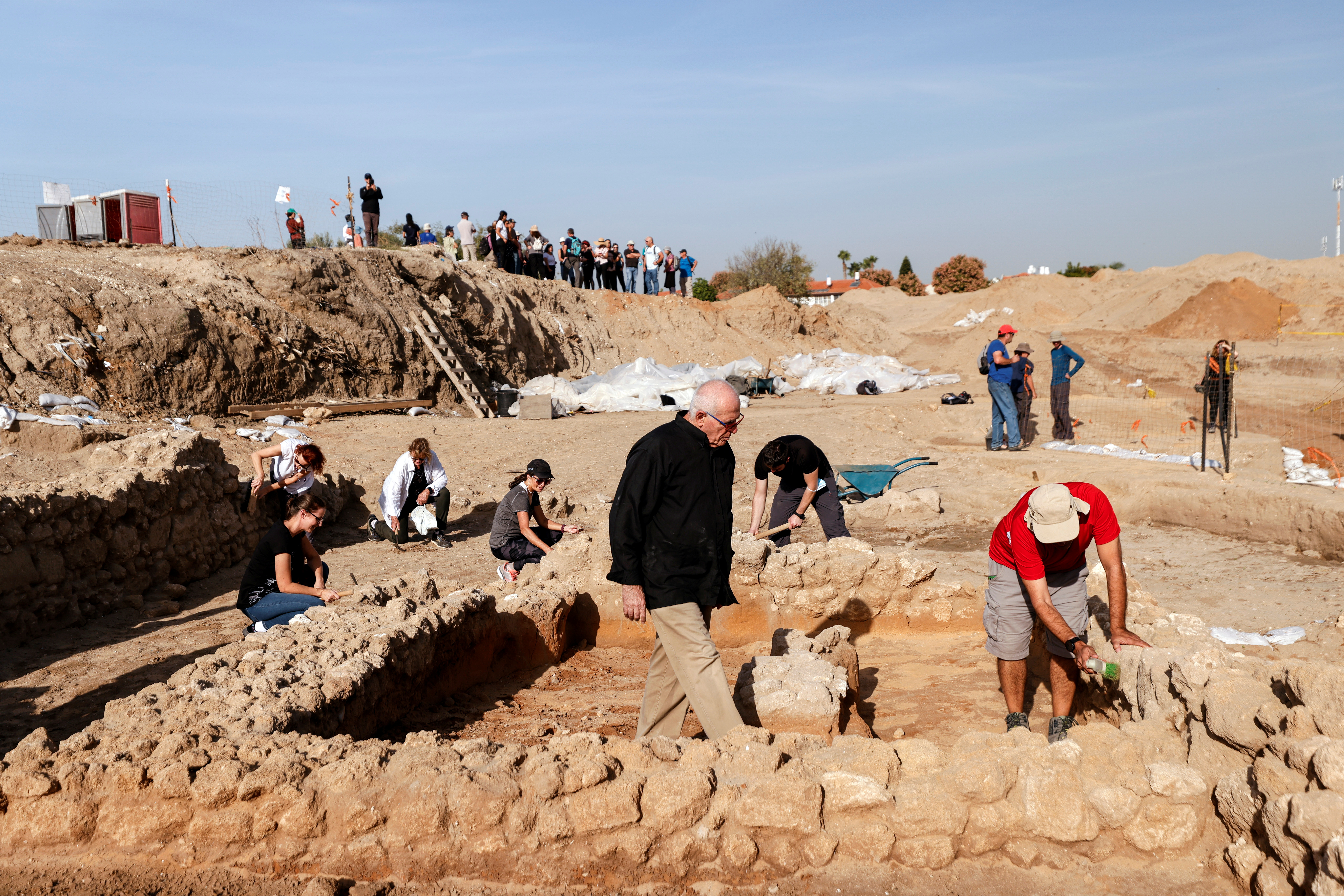 People work at the site of an excavation believed to be from the time of the Sanhedrin, the late first and second centuries CE according to the Israel Antiquities Authority in Yavne, Israel November 29, 2021. REUTERS/Amir Cohen