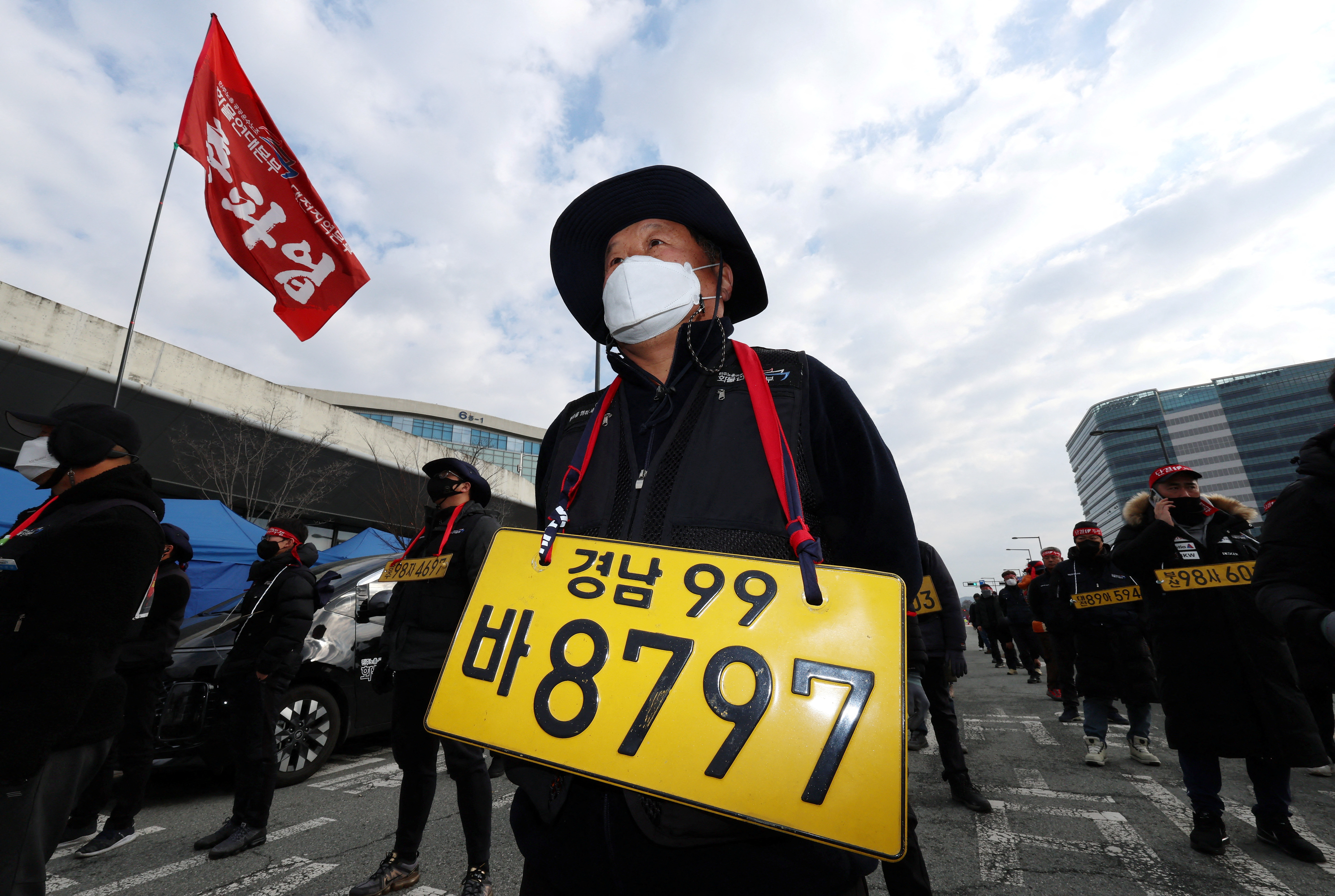 Unionized truckers attend a rally during their strike in Sejong