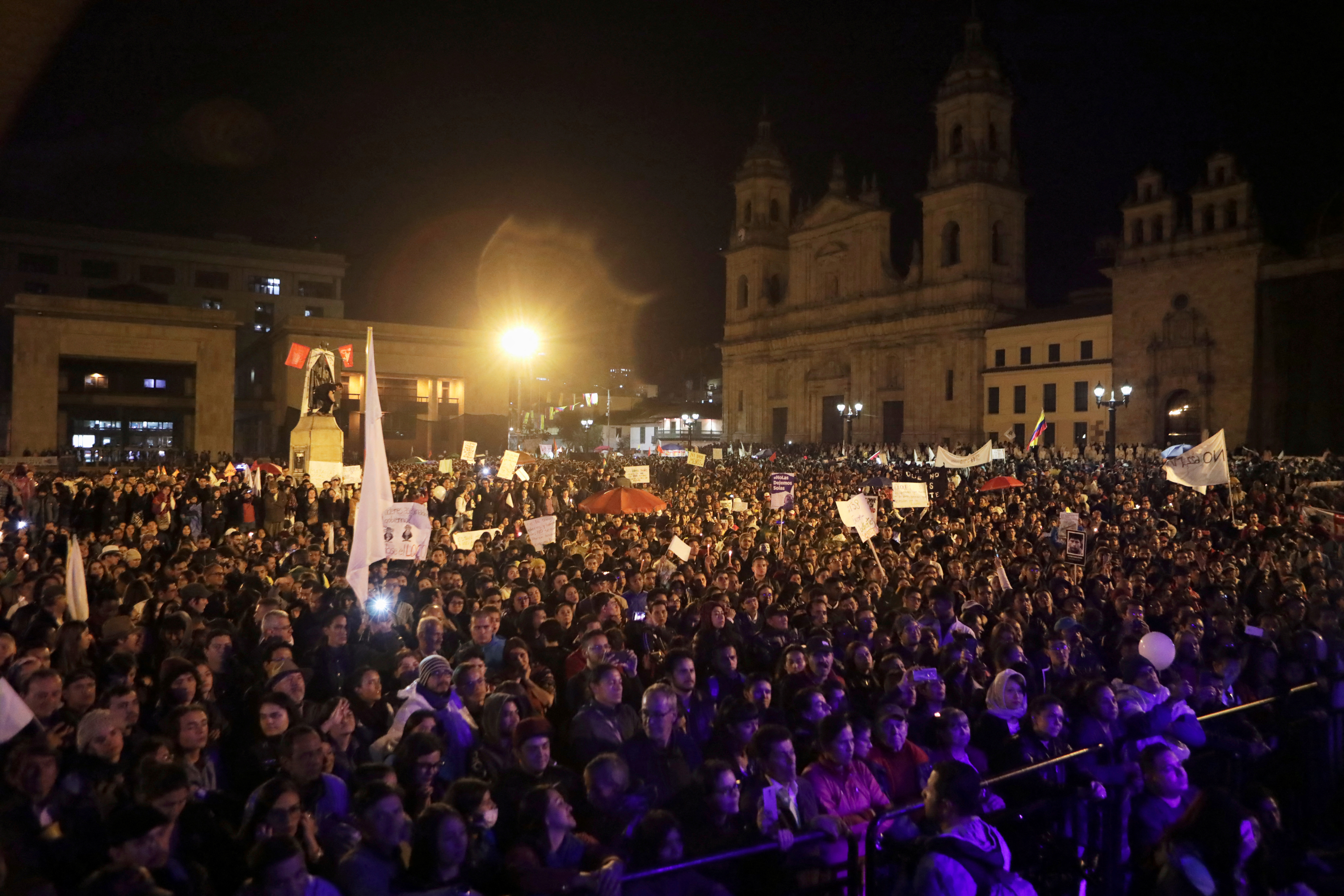 People gather for a protest against the killing of social activists, at the Plaza de Bolivar in Bogota