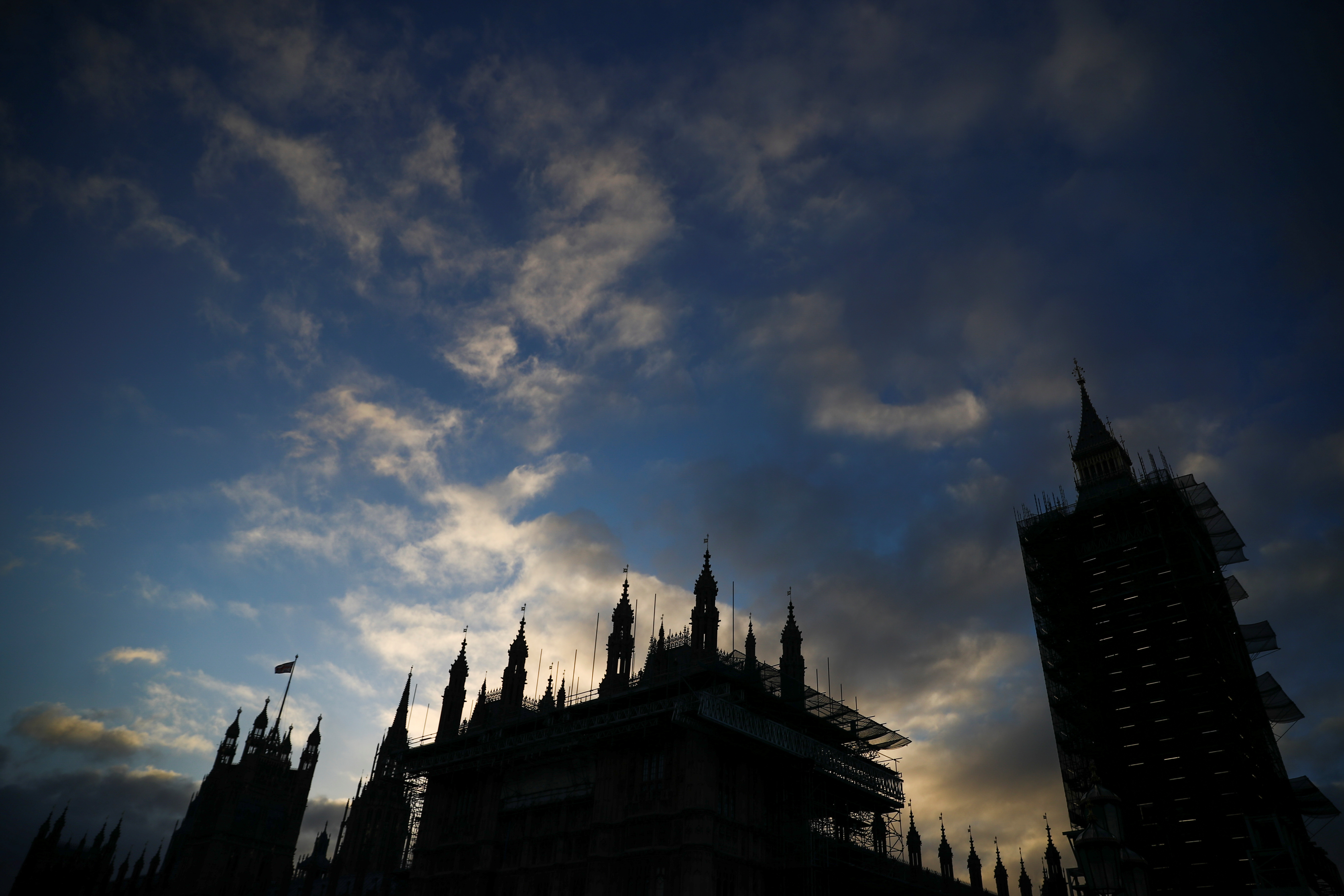 A general view of The Houses of Parliament silhouetted, in London