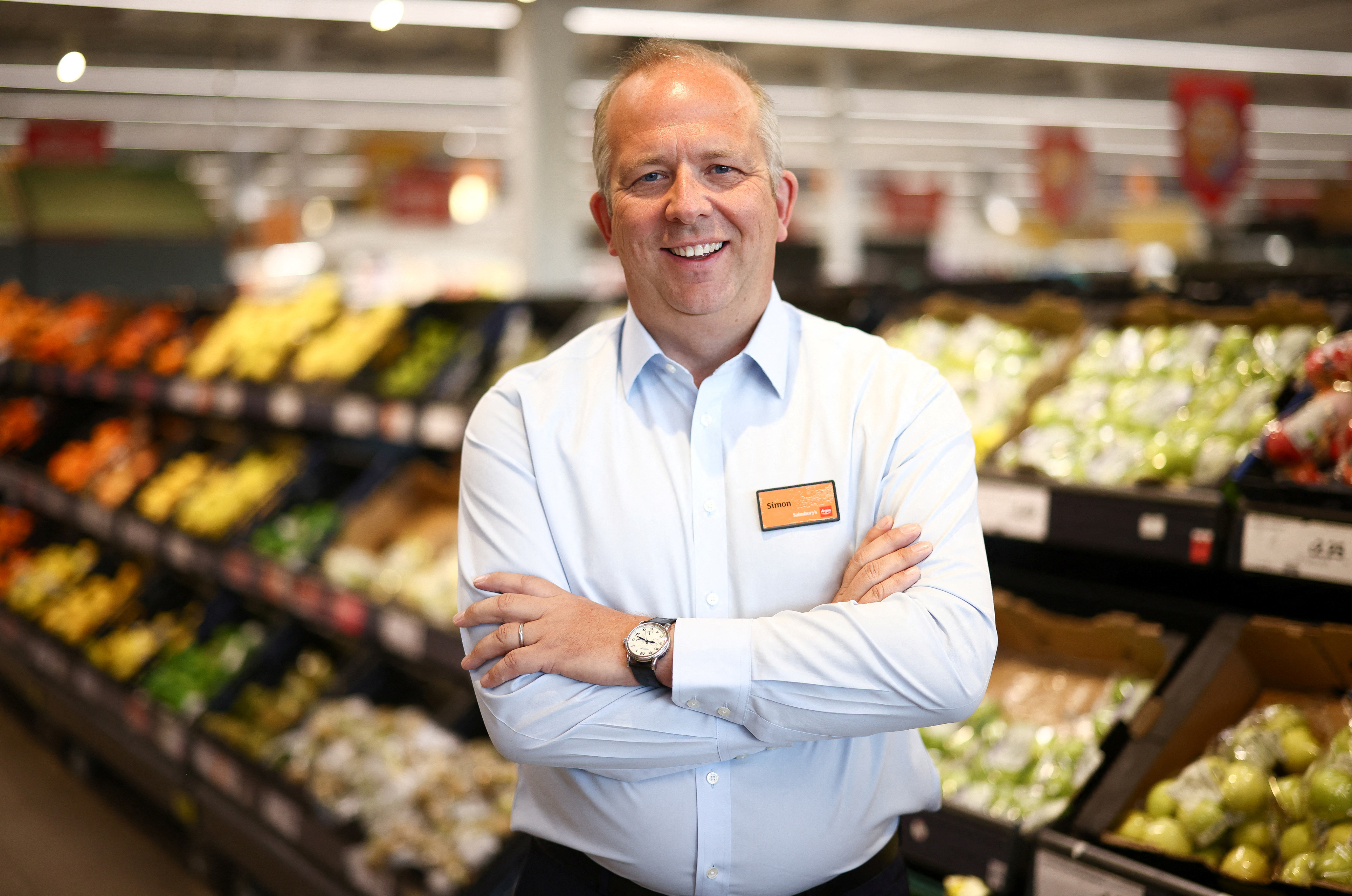Chief Executive Officer of Sainsbury's Simon Roberts poses inside a Sainsbury’s  supermarket in Richmond, west London