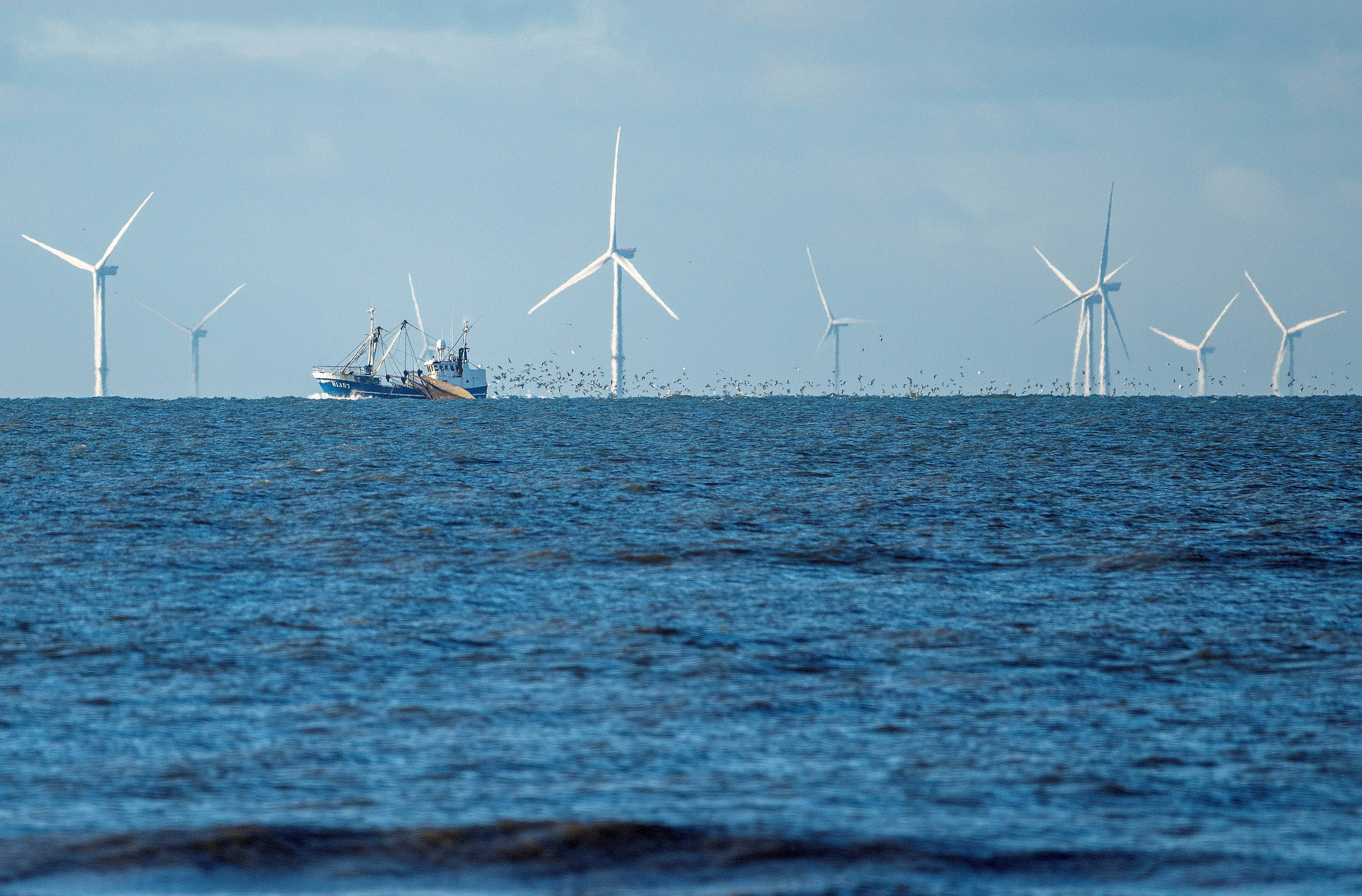 Wind turbines are seen from the Vejers Strand beach