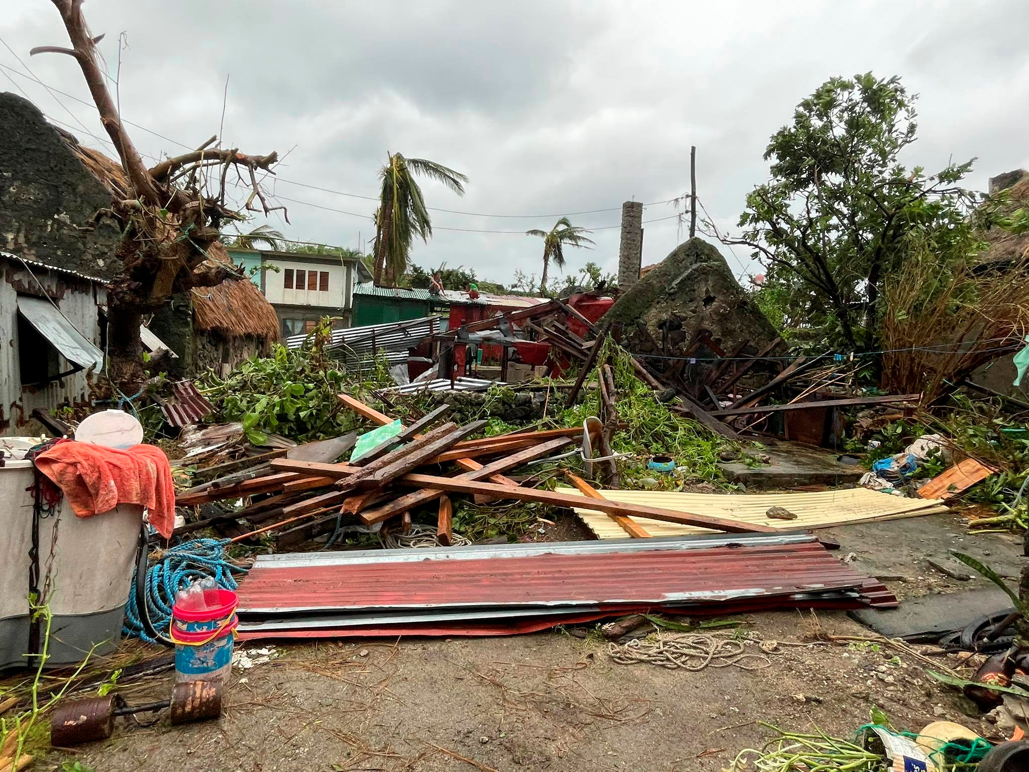 Strong Typhoon Cuts Power, Causes Flooding In Northern Philippines ...