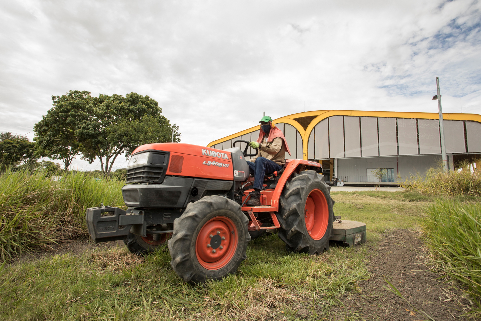 A person drives a tractor at the Future Seeds gene bank in Palmira