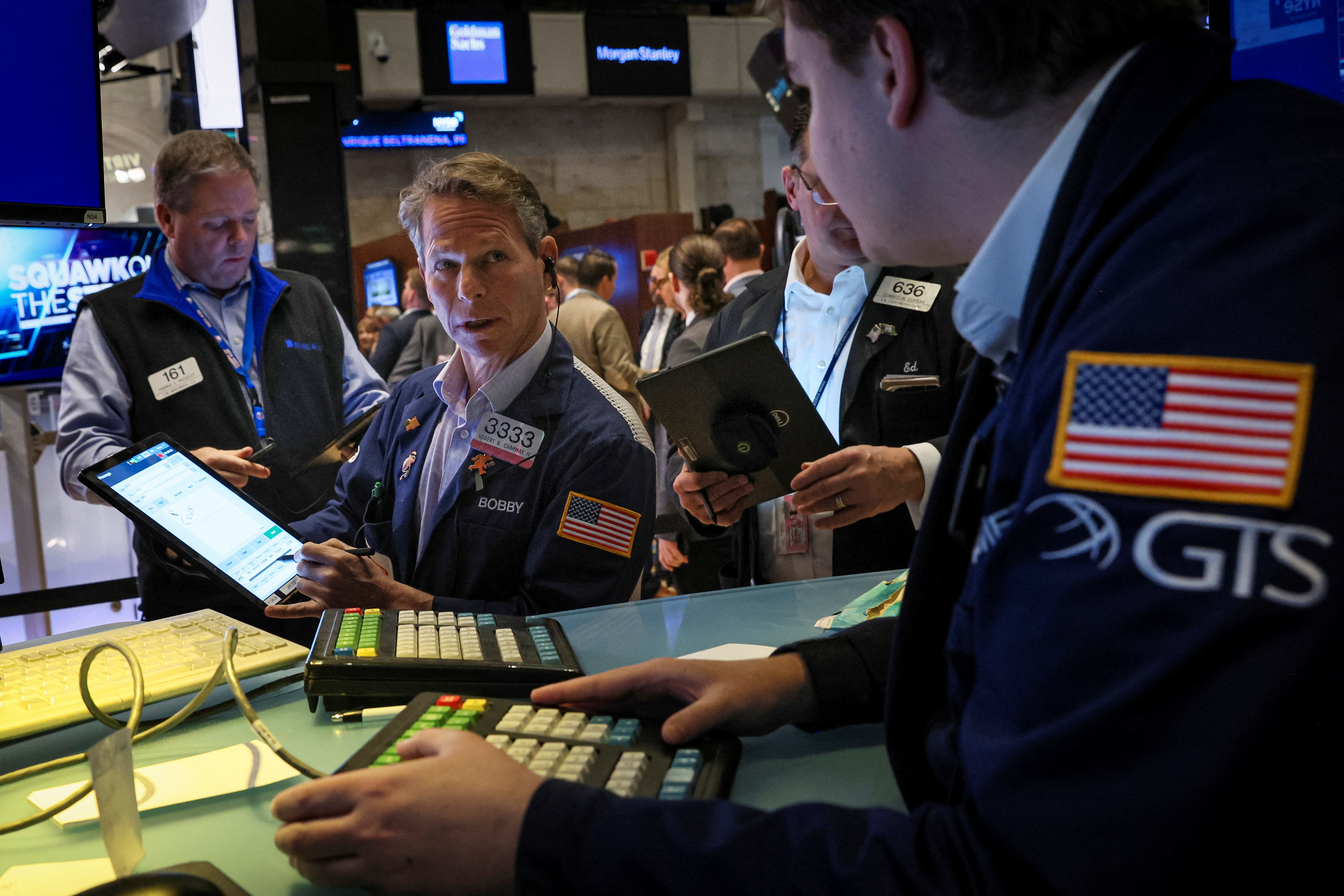 Traders work on the floor of the NYSE in New York.