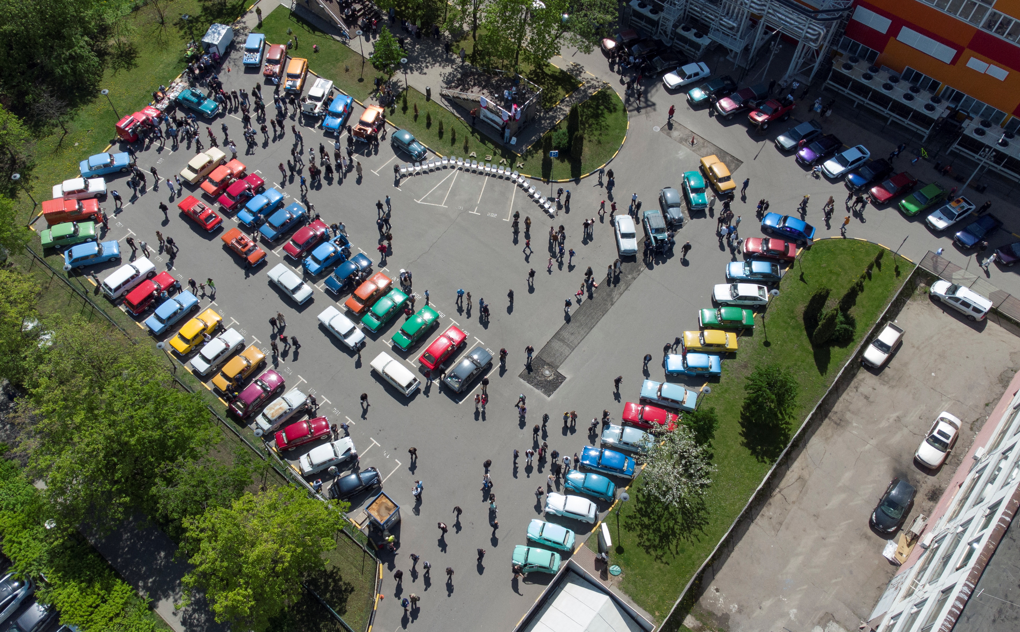 Participants attend a gathering of Soviet-era Moskvich cars owners and enthusiasts in Moscow