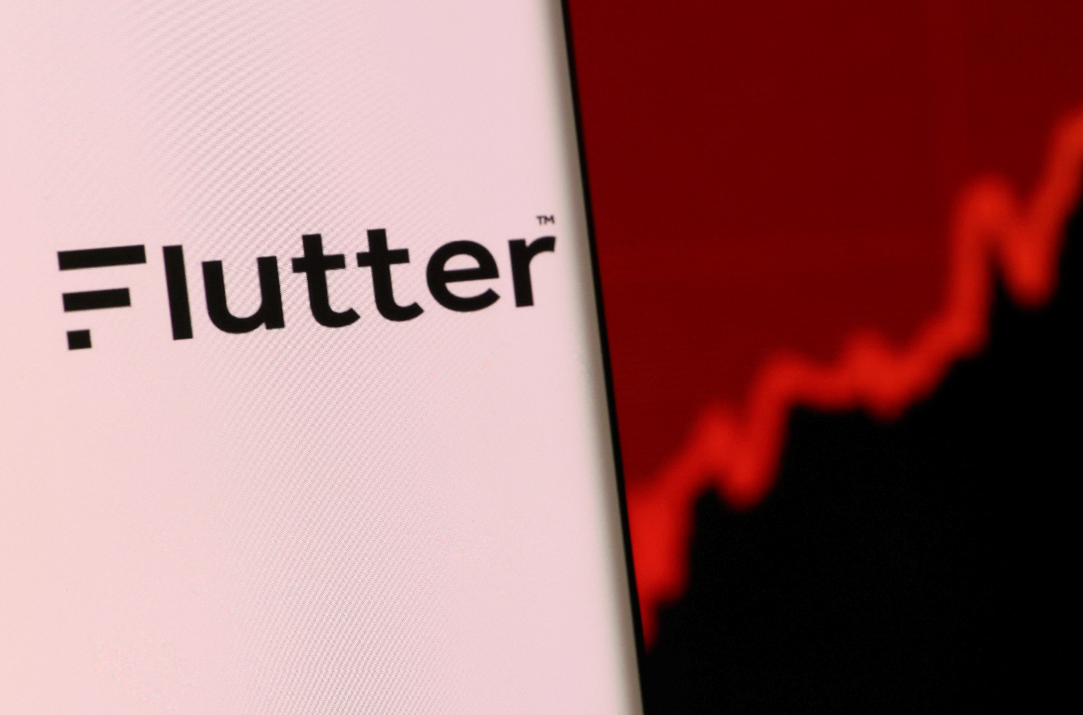 Illustration shows smartphone with Flutter's logo displayed