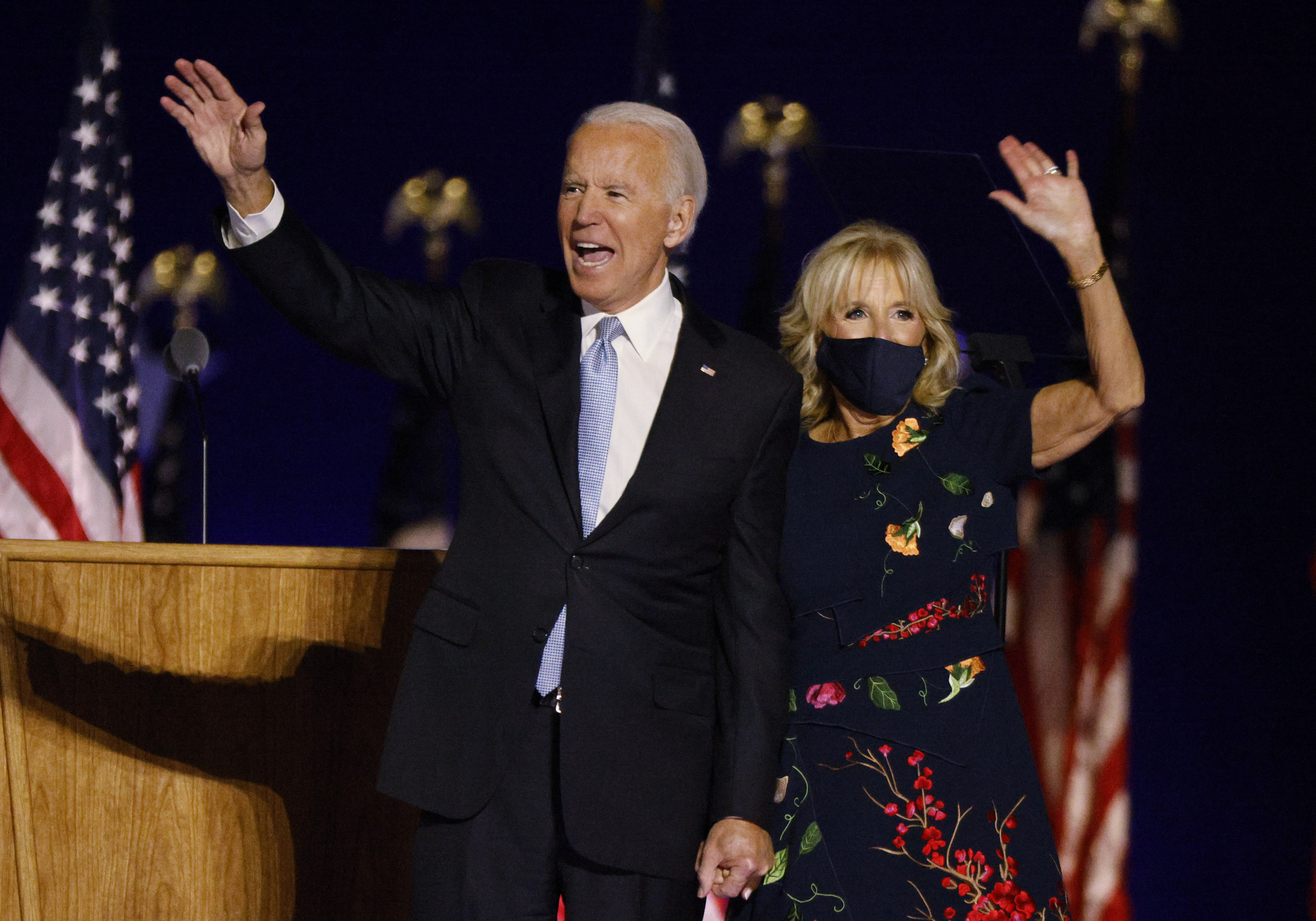 Democratic 2020 U.S. presidential nominee Joe Biden and his wife Jill wave to the crowd at his election rally in Wilmington