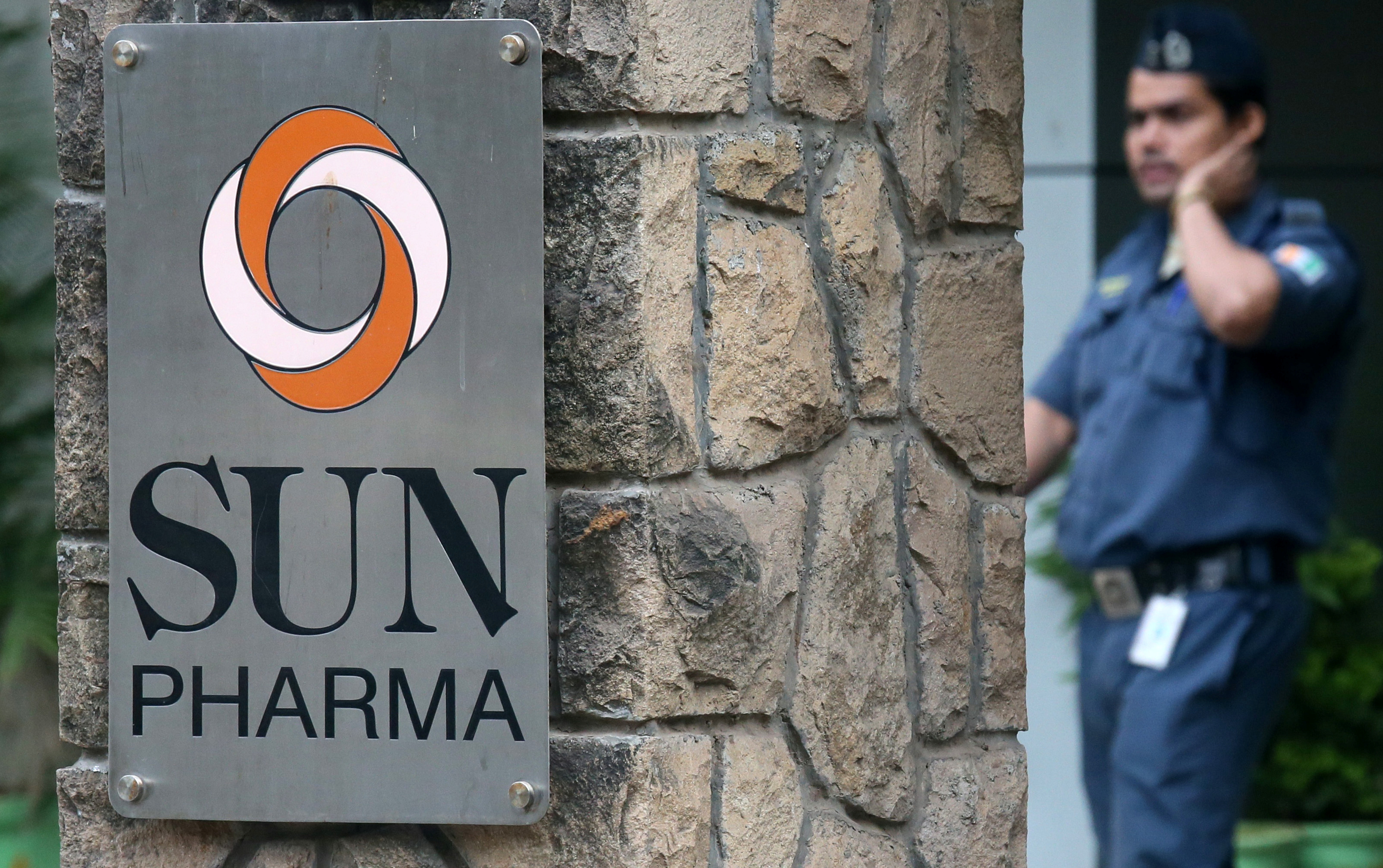 A guard walks inside the office of Sun Pharmaceutical Industries Ltd in Mumbai