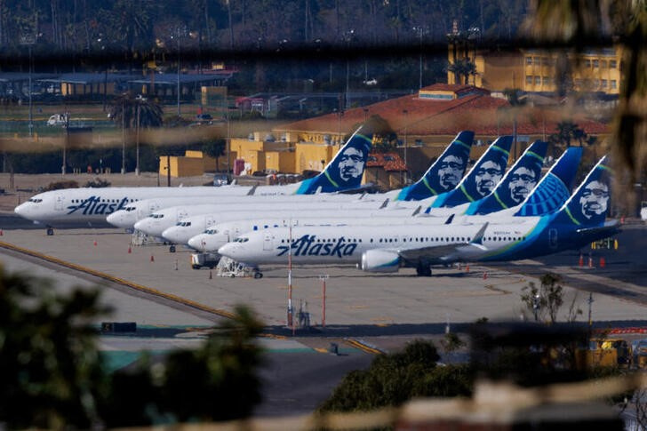 Alaska Airlines commercial airplanes are shown parked in San Diego