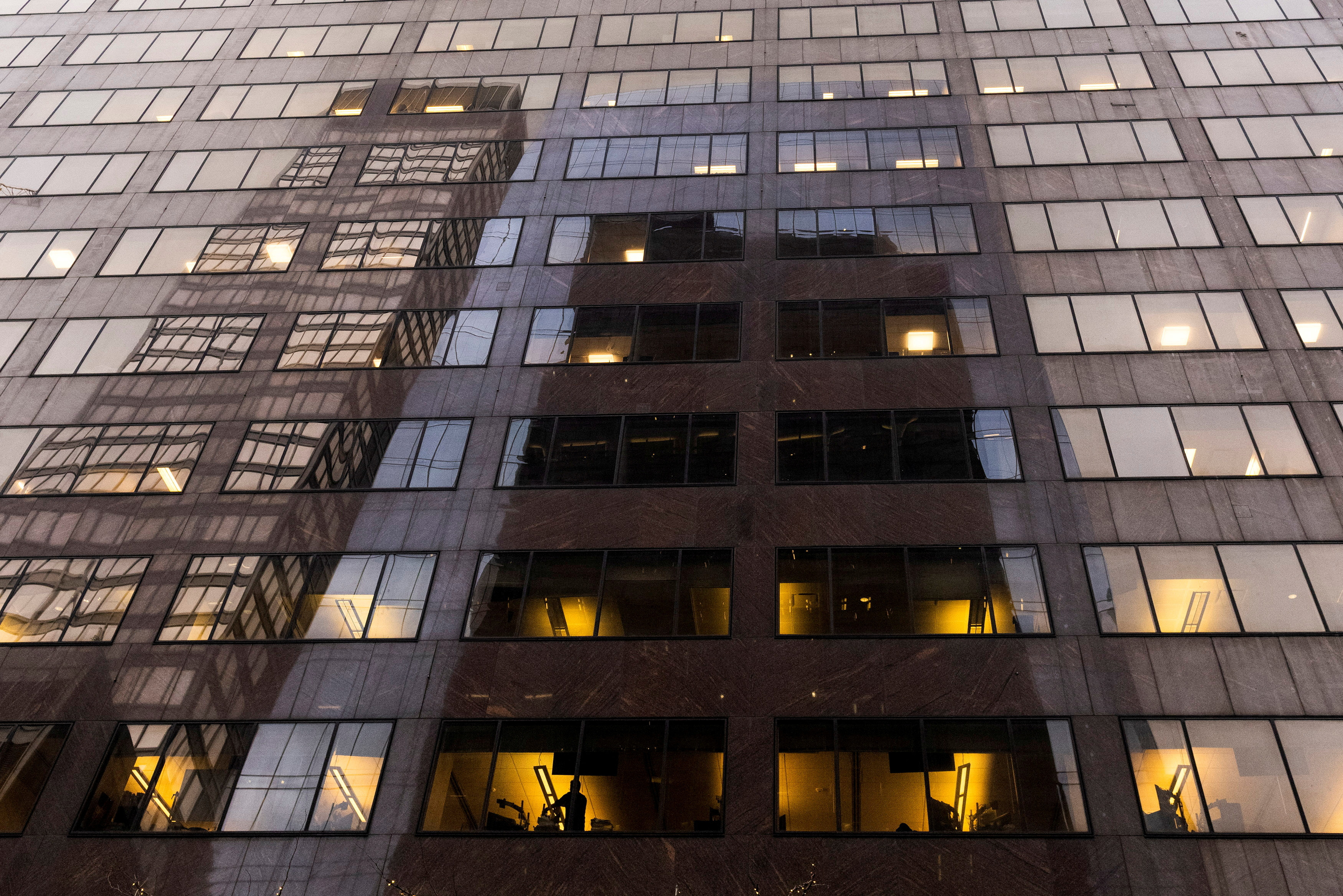 A man works inside Jefferies Financial Group offices in Manhattan, New York City