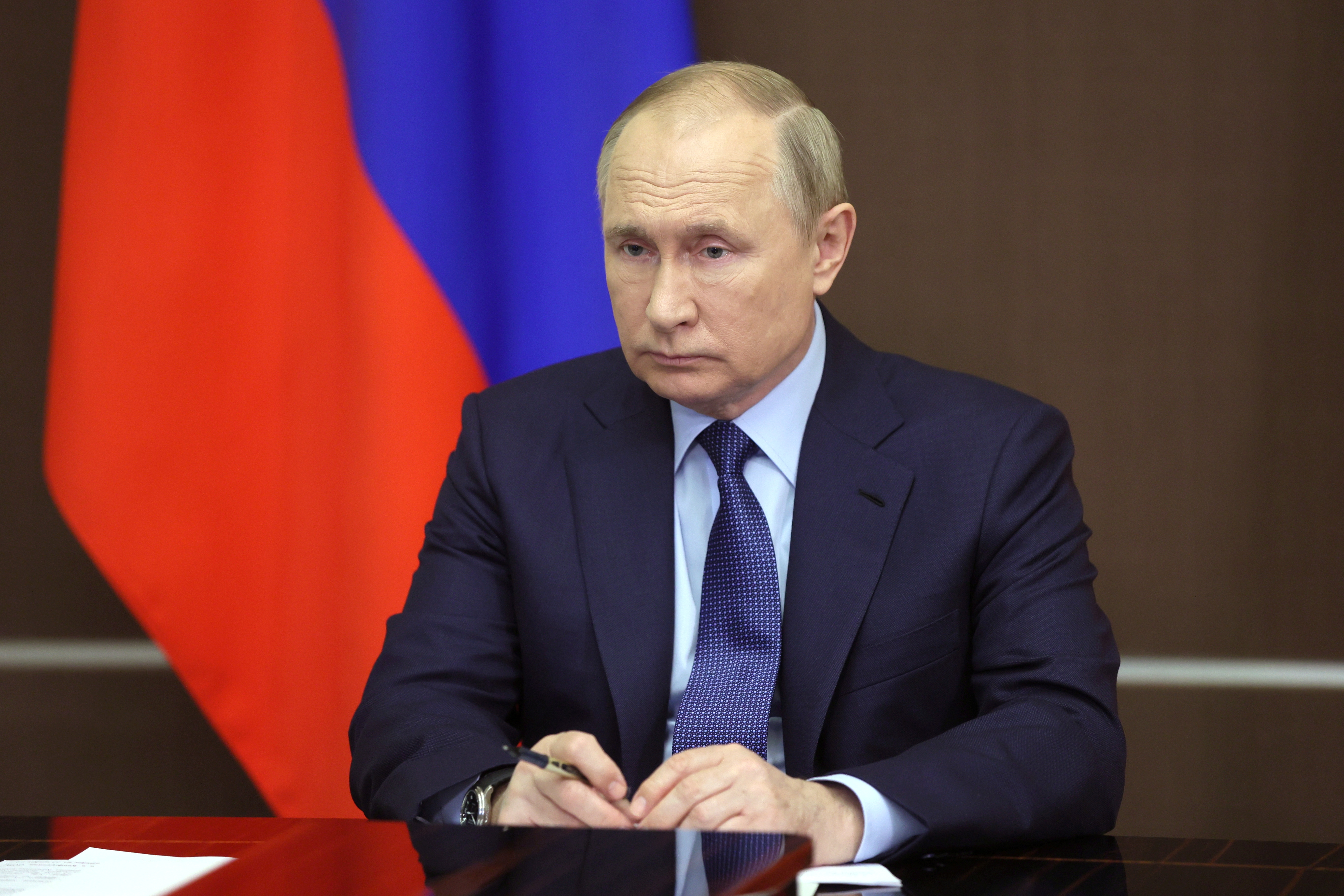 Russian President Vladimir Putin attends a meeting with government members in Sochi