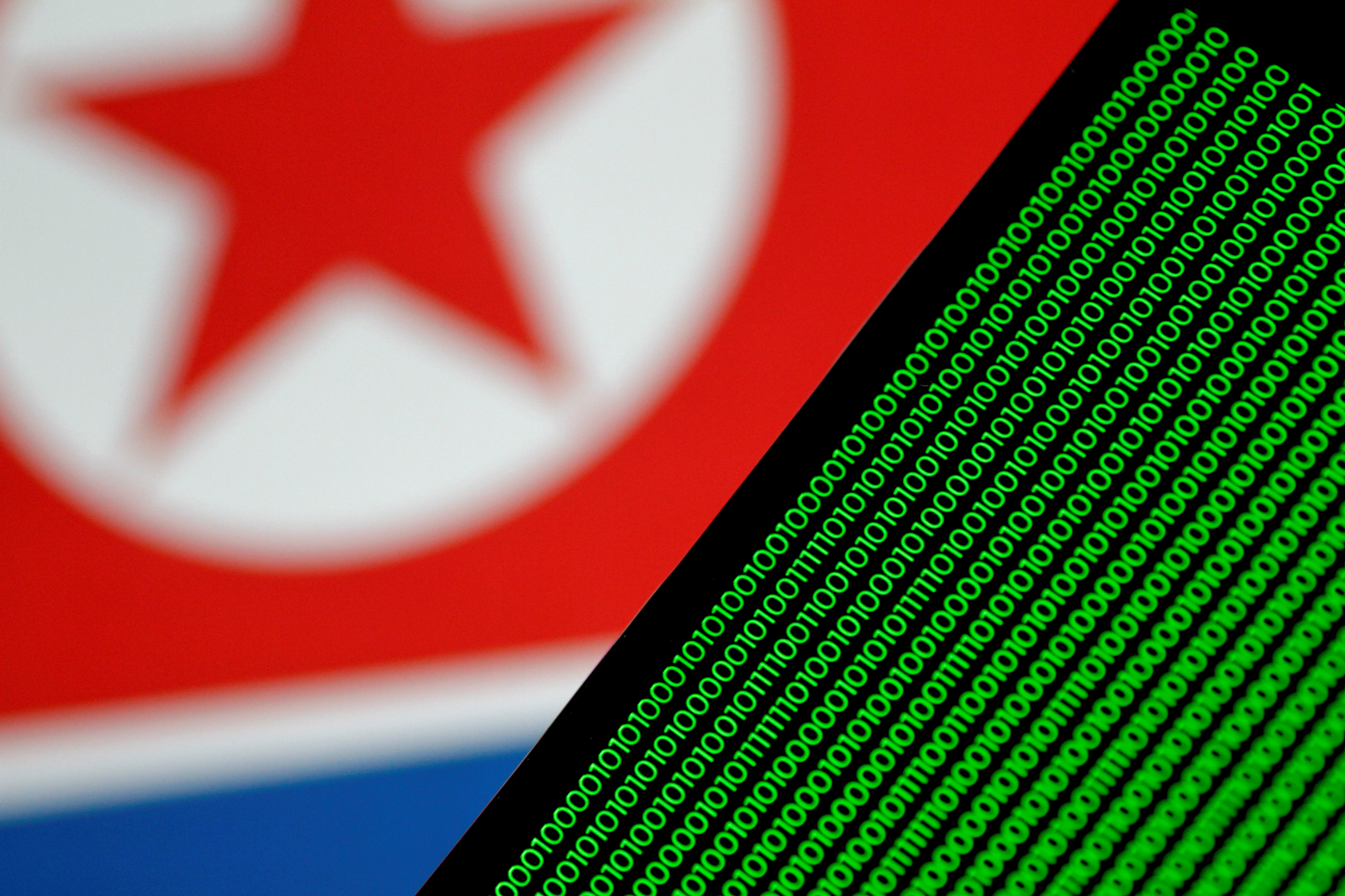Illustration photo of binary code against a North Korean flag