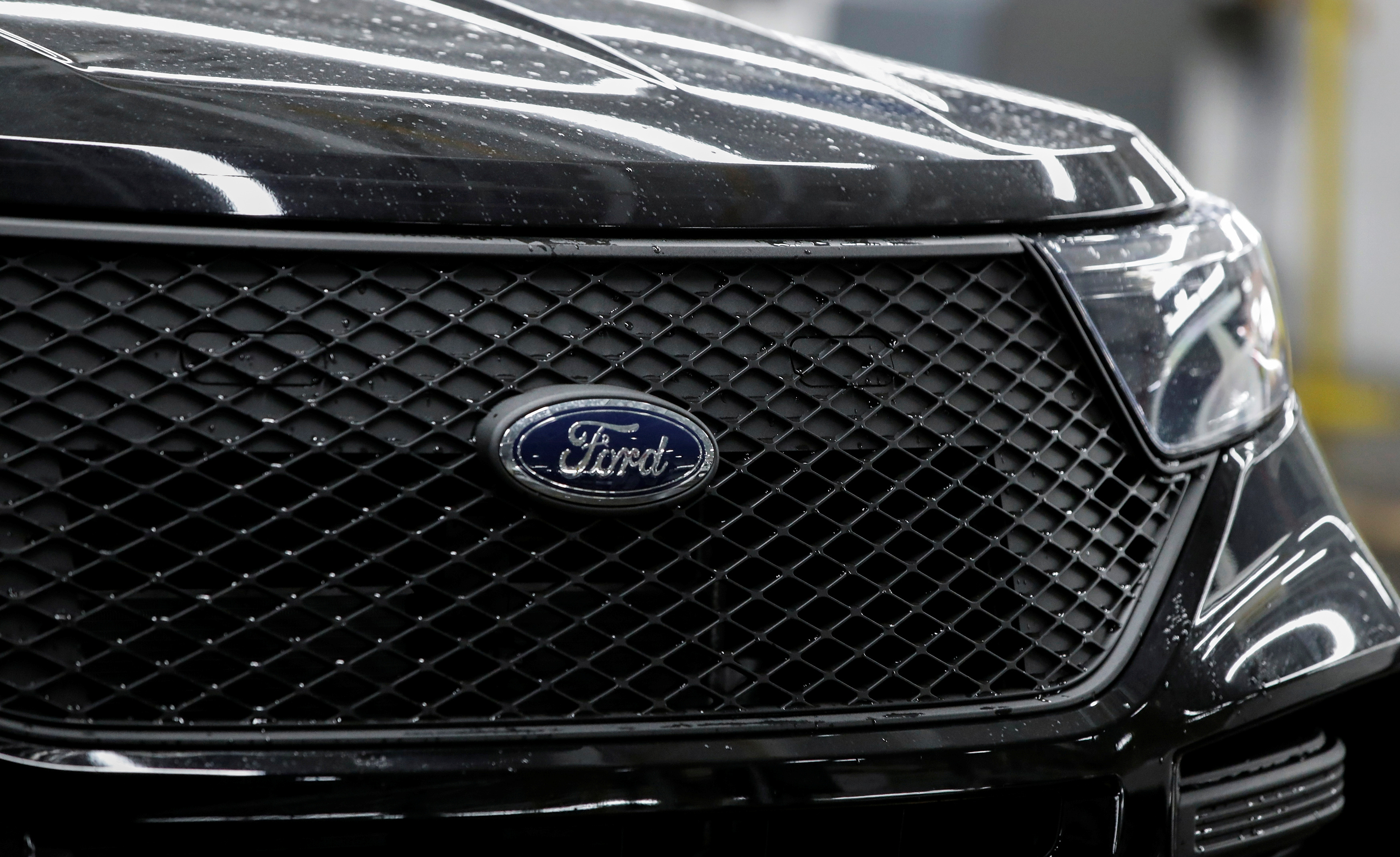 The logo of Ford is seen on a 2020 Ford Explorer car at Ford's Chicago Assembly Plant in Chicago