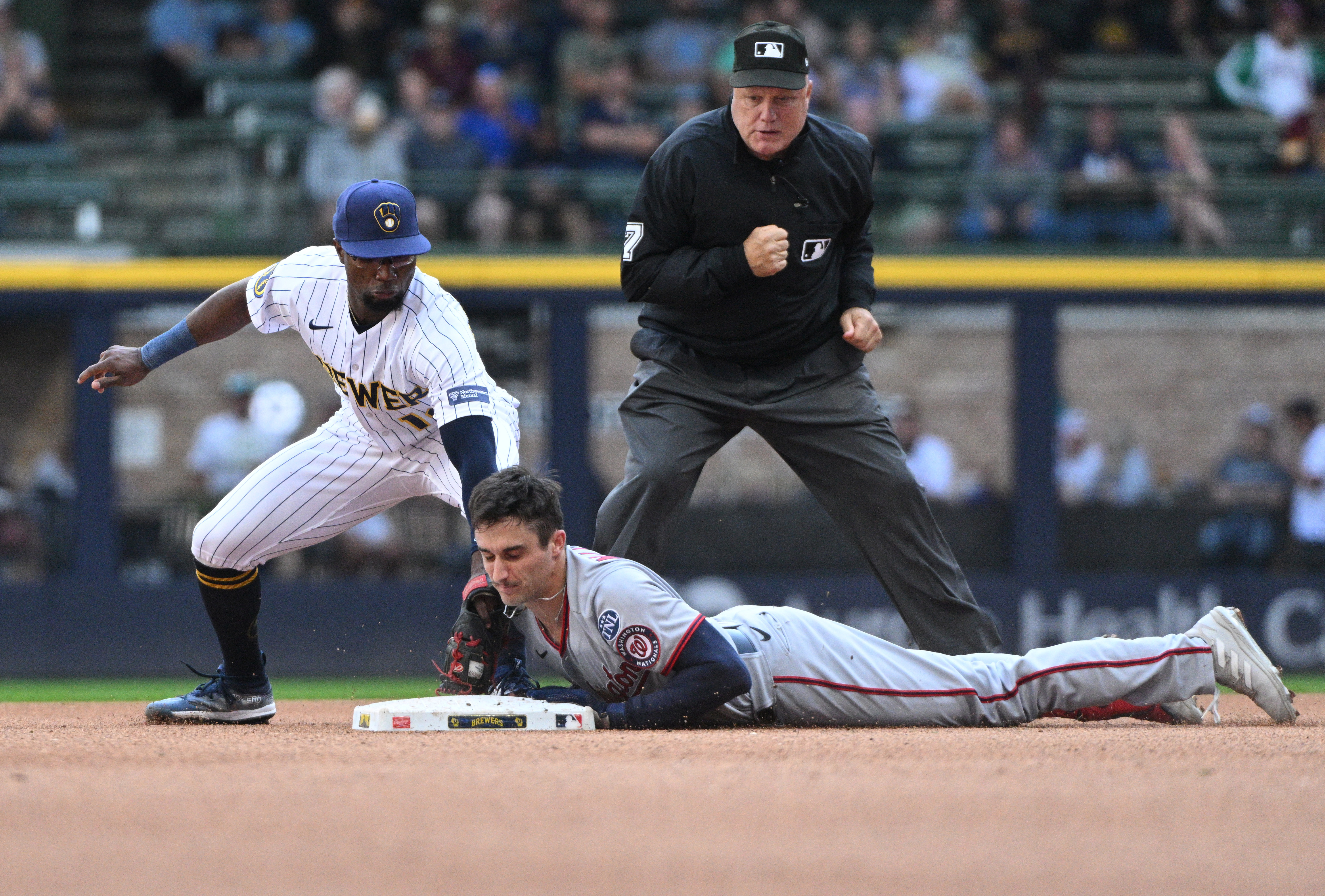 Nats edge Brewers in 11, halt 5-game skid