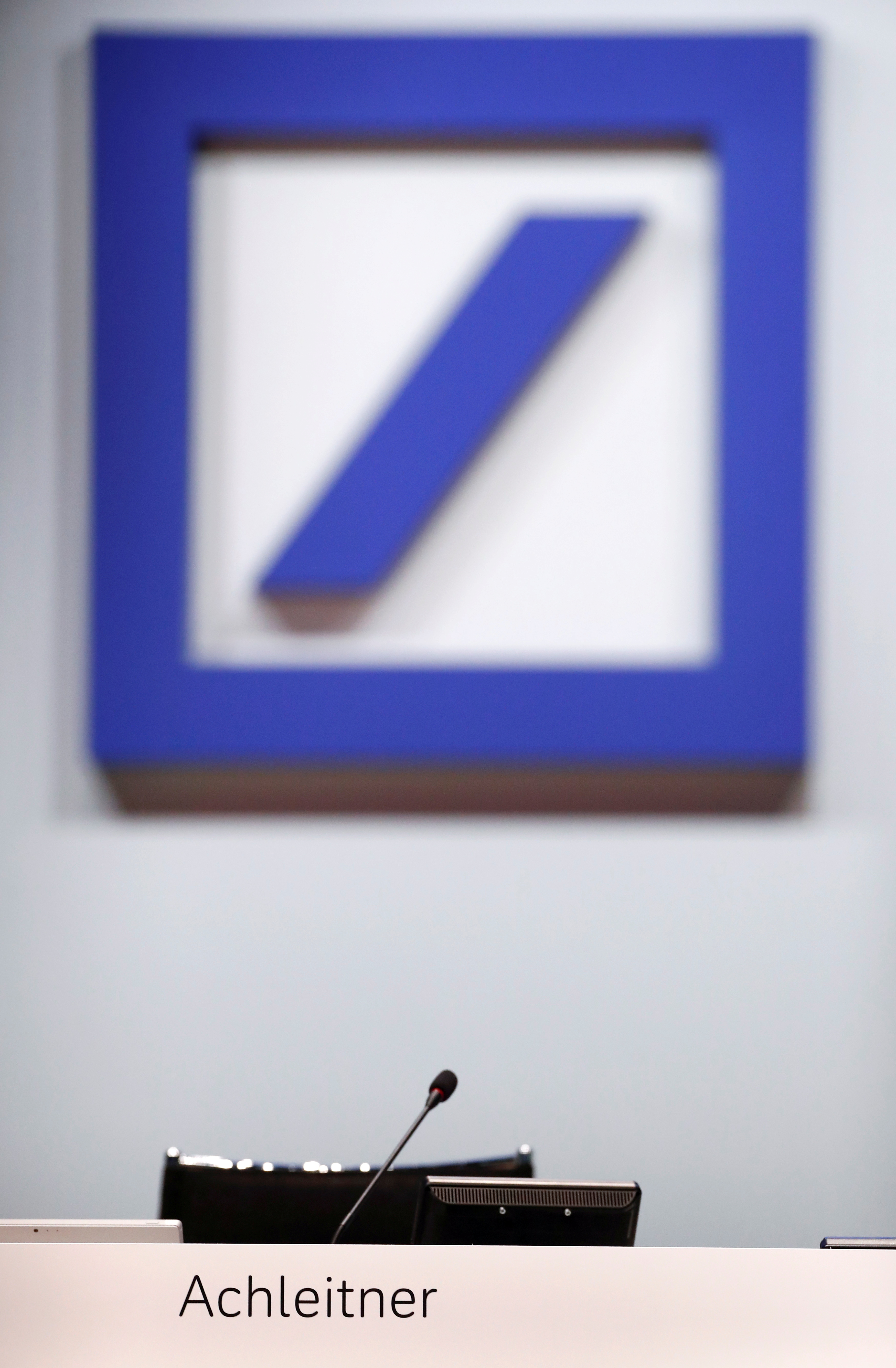 The logo of Deutsche Bank is on display during the bank's annual shareholder meeting in Frankfurt