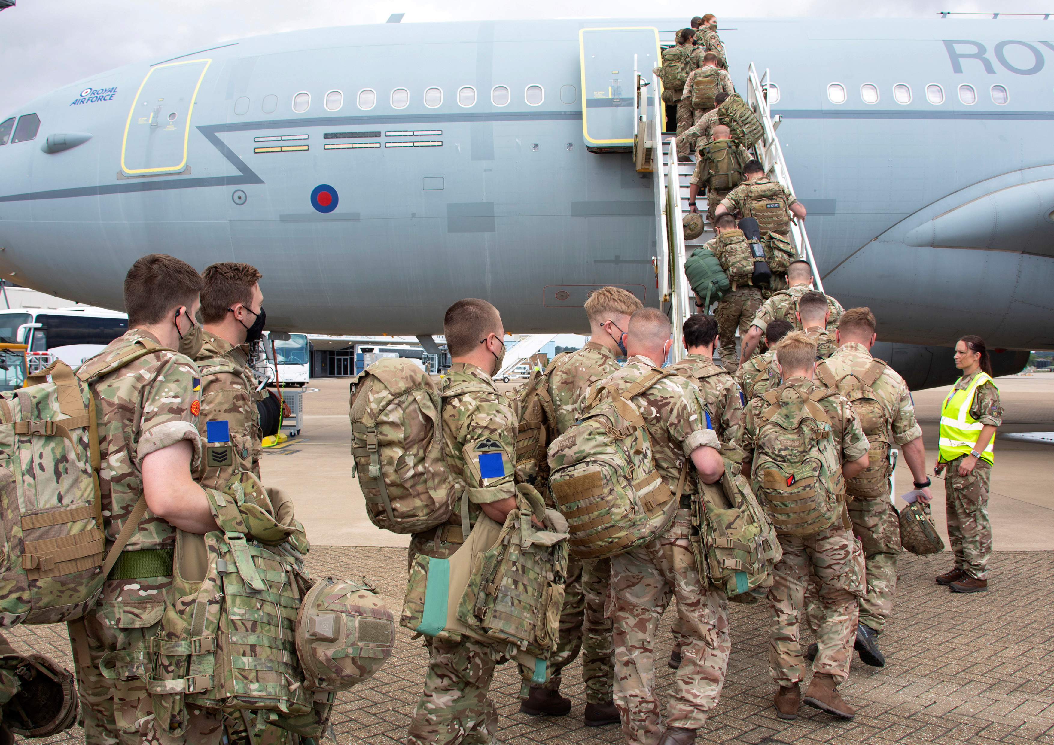Military personnel board an RAF Voyager aircraft at RAF Brize Norton, as they leave for Afghanistan to provide support to British nationals leaving the country