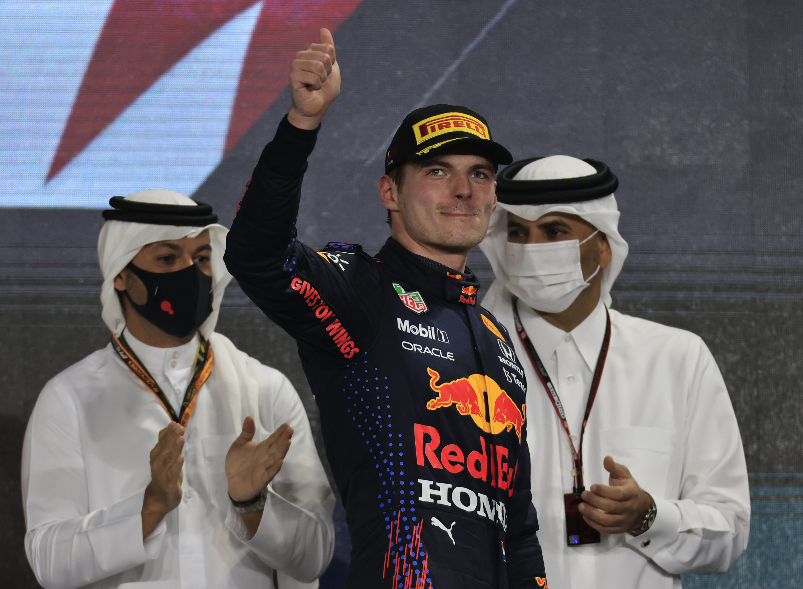 Formula One F1 - Qatar Grand Prix - Losail International Circuit, Lusail, Qatar - November 21, 2021 Second placed Red Bull's Max Verstappen celebrates on the podium REUTERS/Thaier Al-Sudani