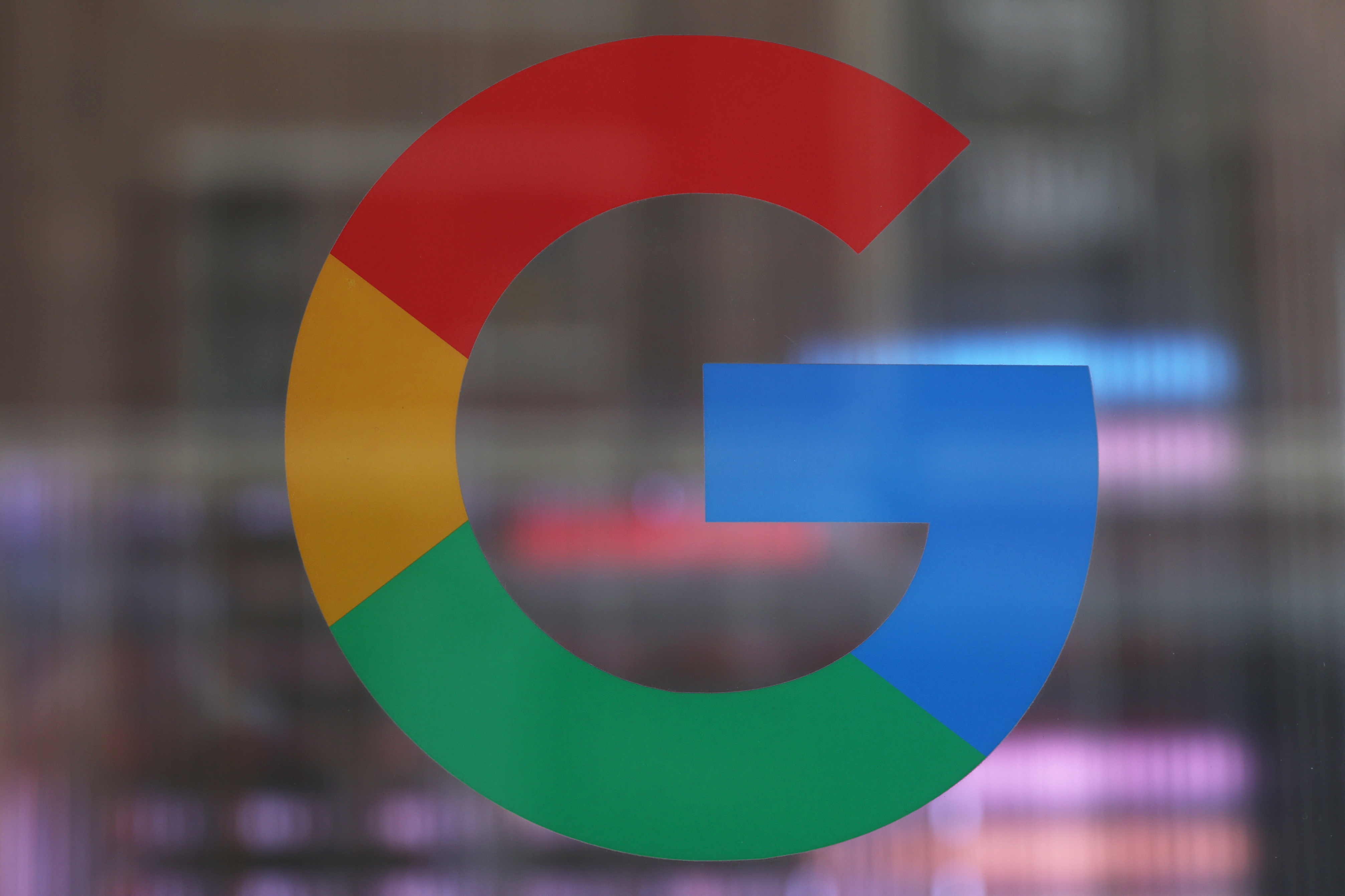 The logo of Google LLC is seen at the Google Store Chelsea in New York City