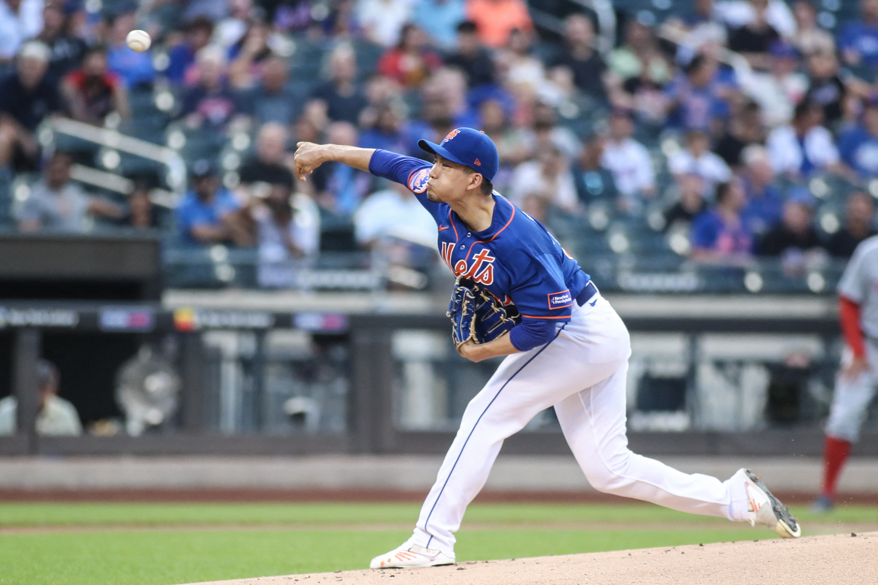 After rain delay, Mets eke out win over Nationals