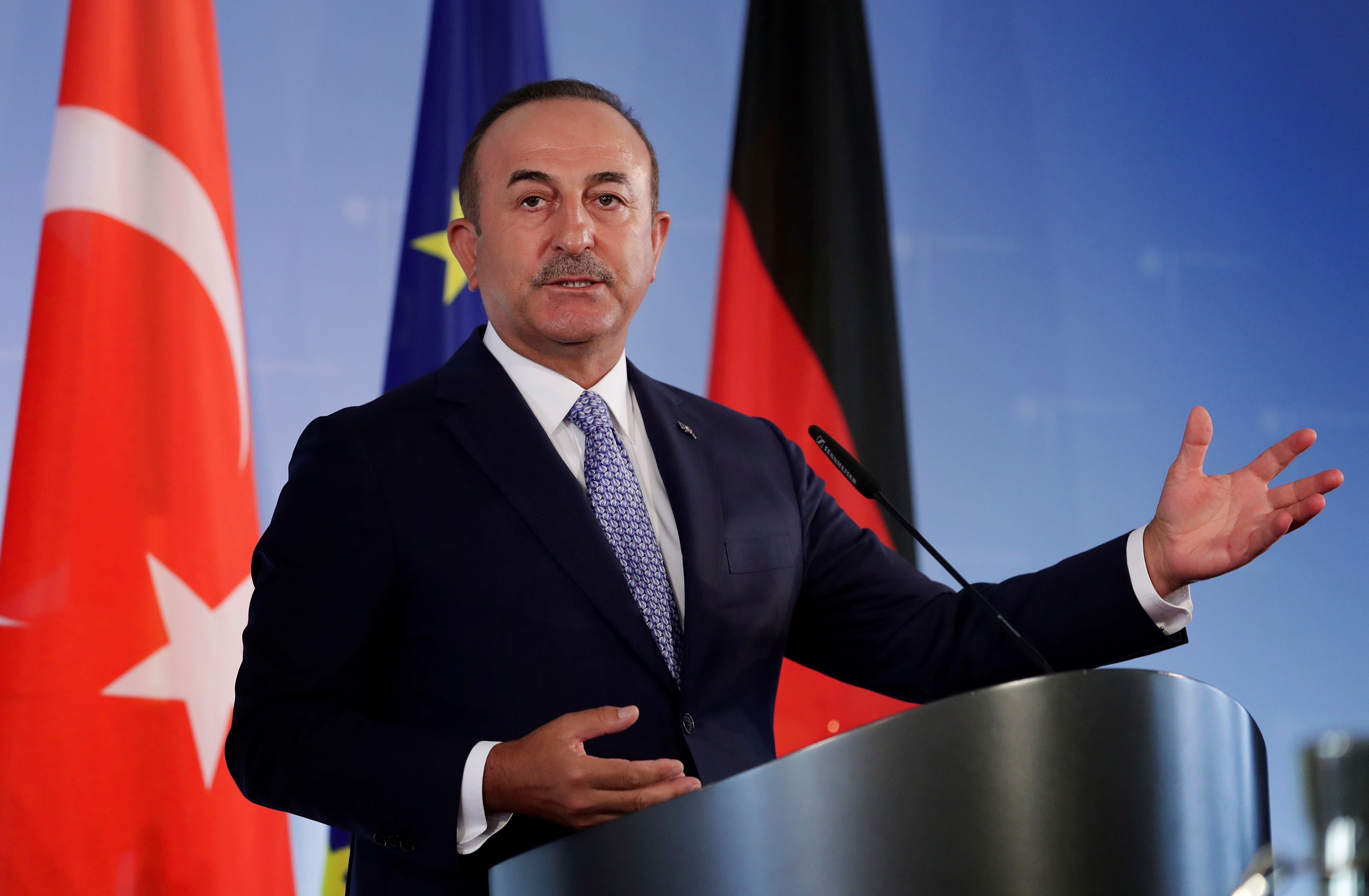 German Foreign Minister Heiko Maas and Turkish Foreign Minister Mevlut Cavusoglu address the media during a joint news conference after a meeting in Berlin