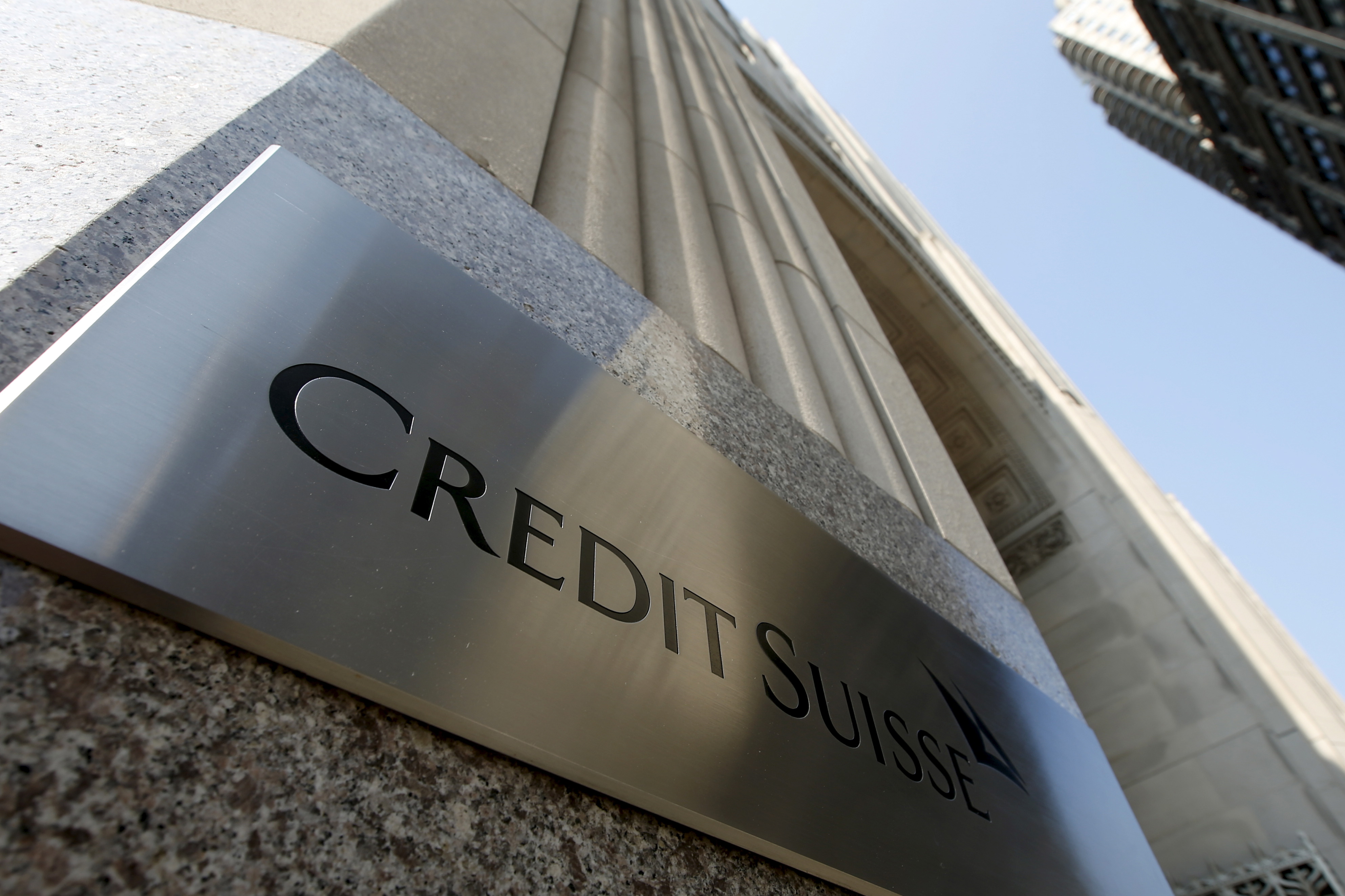 A Credit Suisse sign is seen on the exterior of their Americas headquarters in the Manhattan borough of New York City