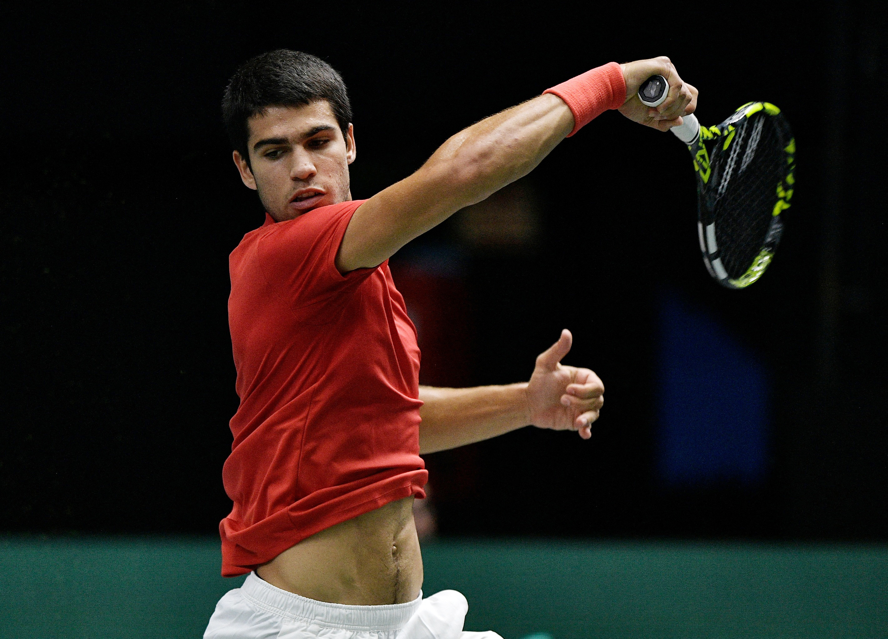 Alcaraz fires Spain into Davis Cup quarters, Italy down Sweden | Reuters