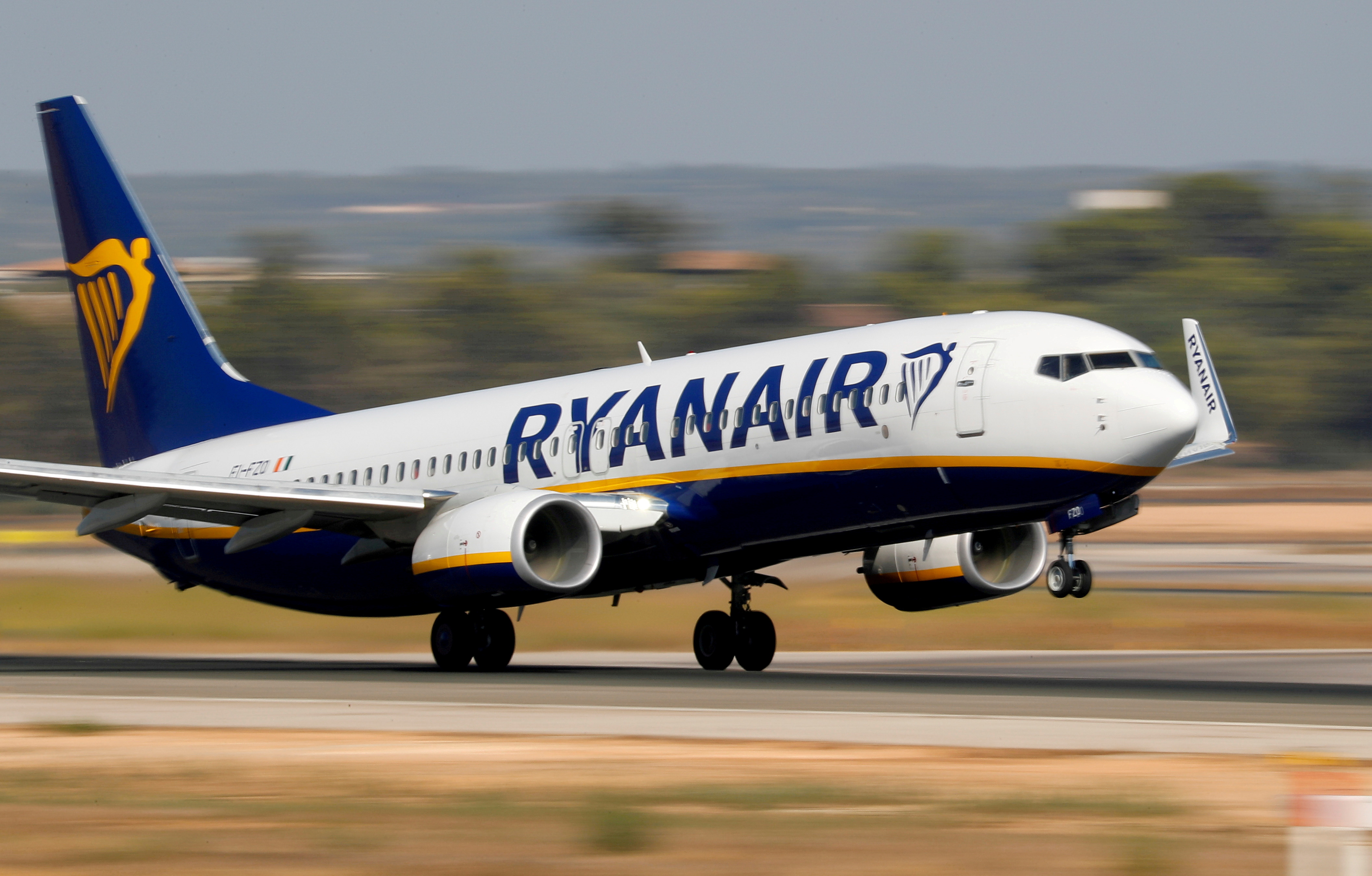 A Ryanair Boeing 737 airplane takes off from the airport in Palma de Mallorca