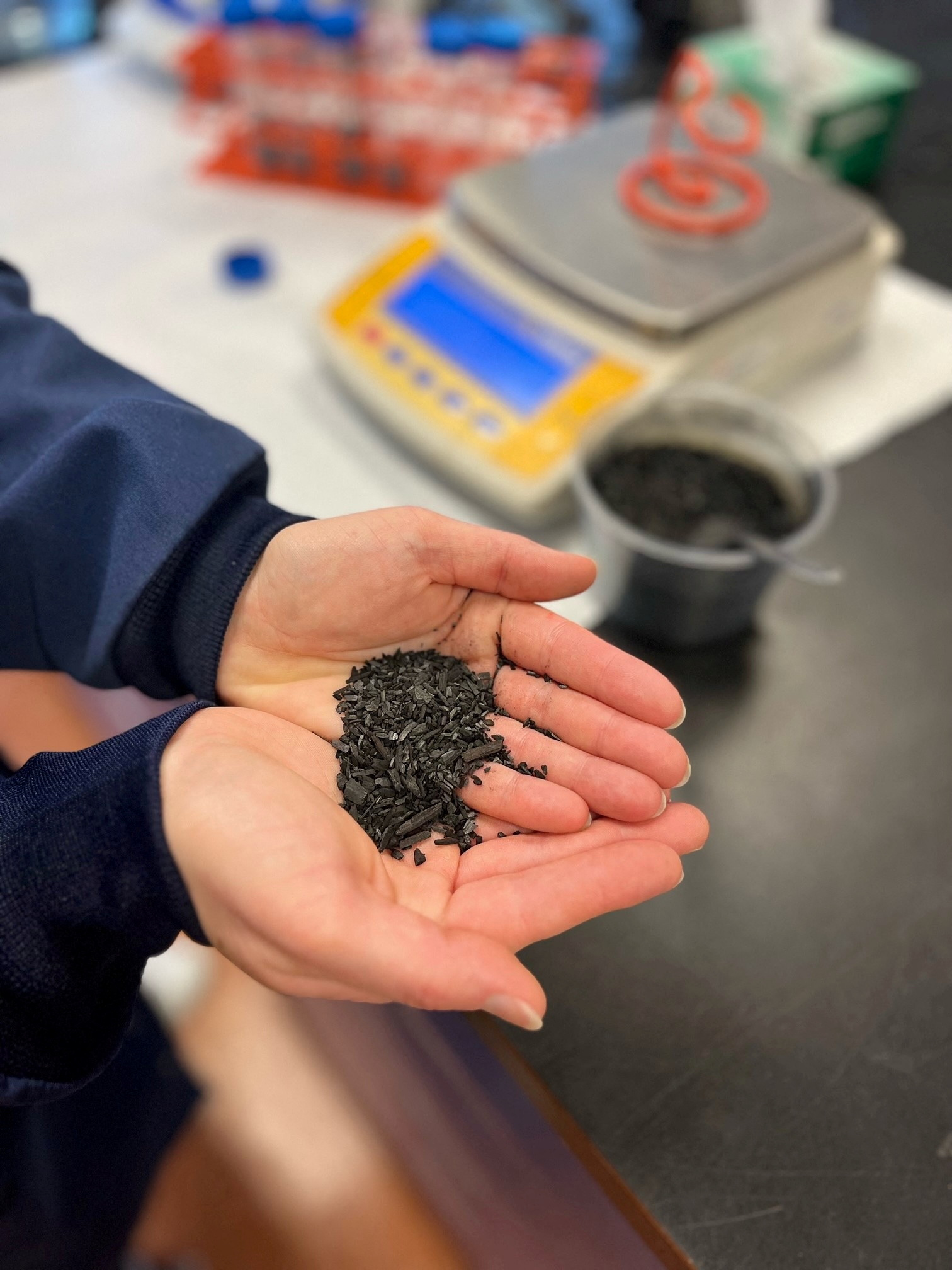 Scientist Vicky Levesque weighs biochar samples to measure the pH at Kentville Research Development Centre, in Kentville Nova Scotia