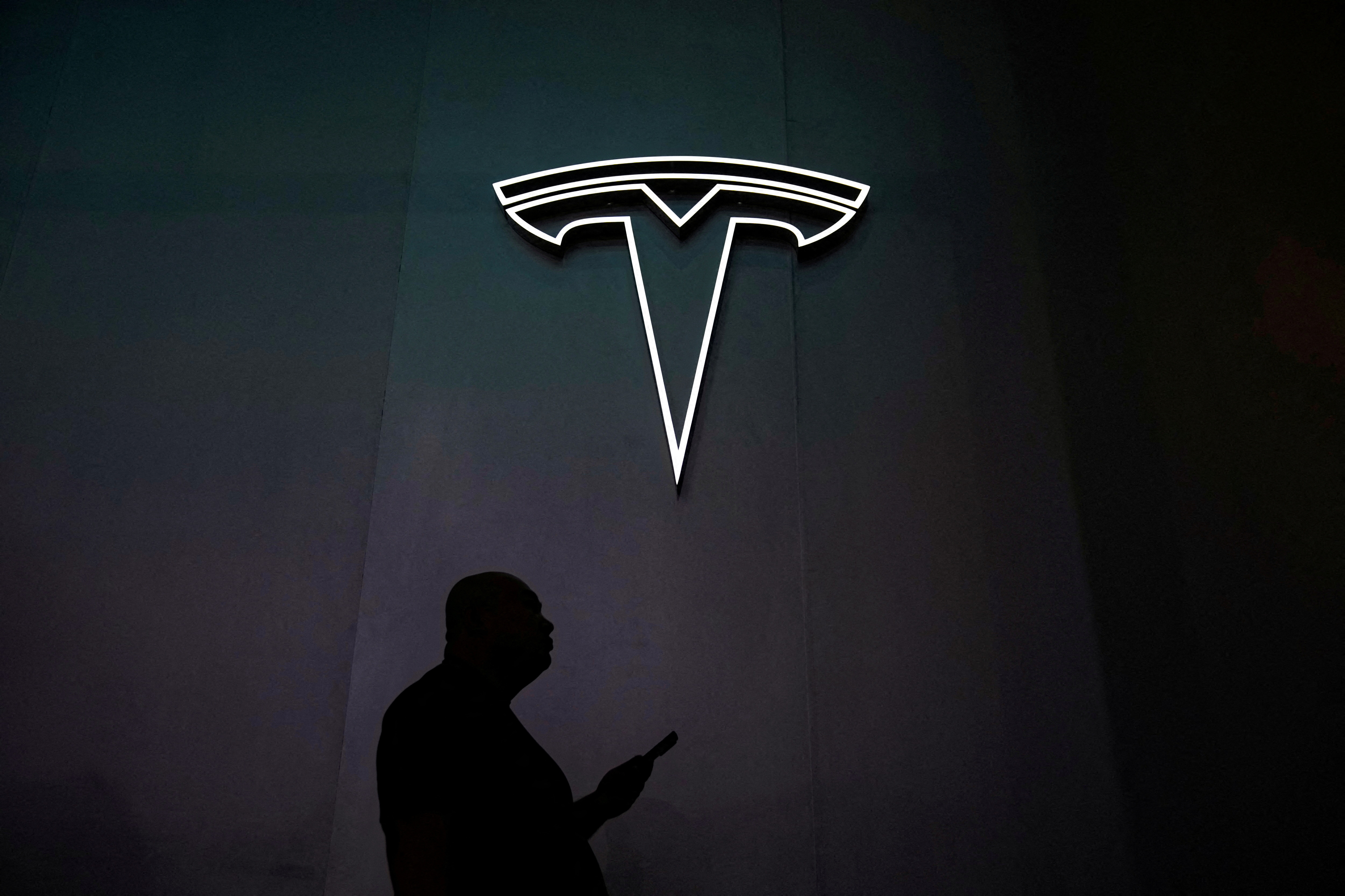 Tesla sign is seen at the World Artificial Intelligence Conference (WAIC) in Shanghai