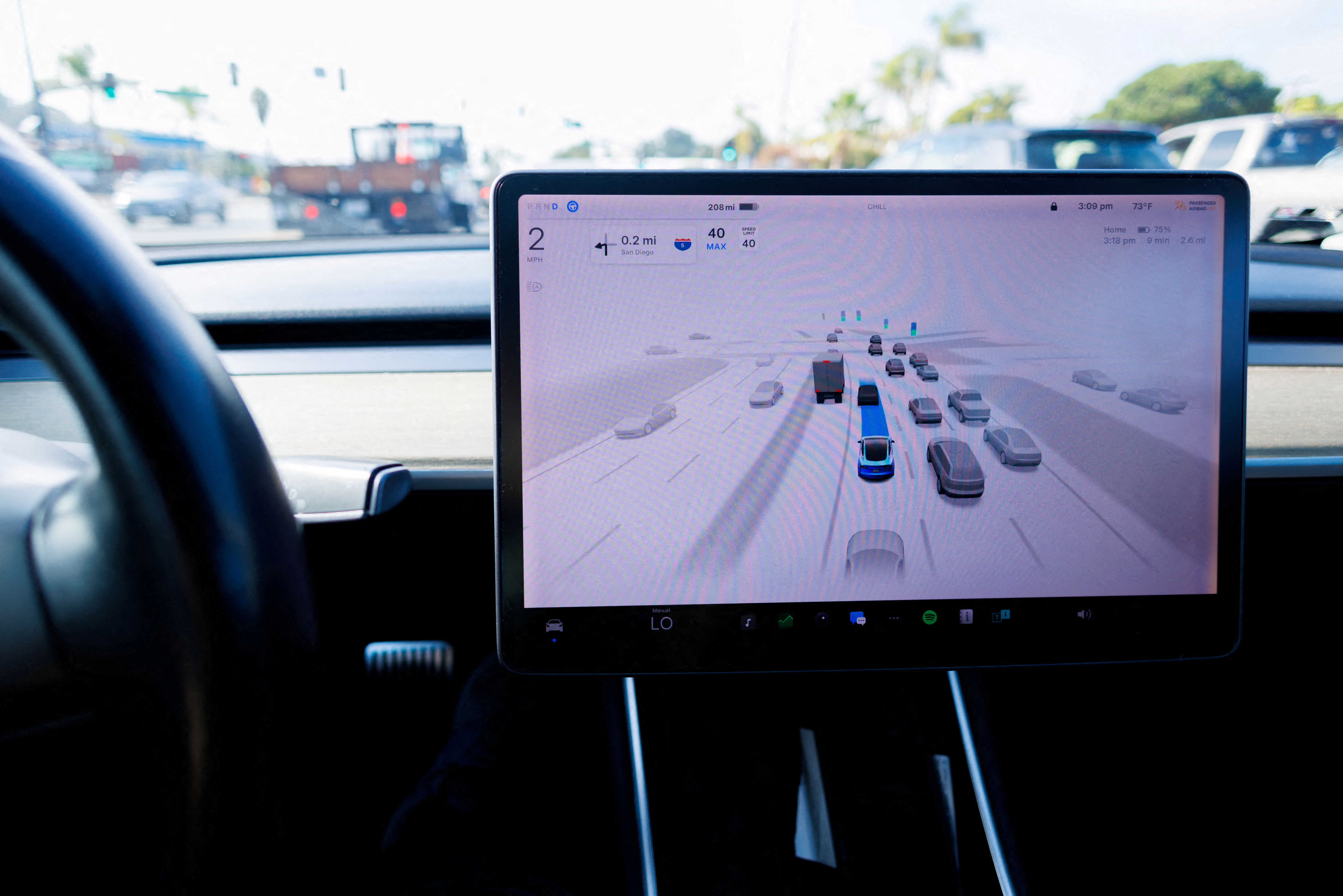 Tesla Model 3 vehicle self driving in California