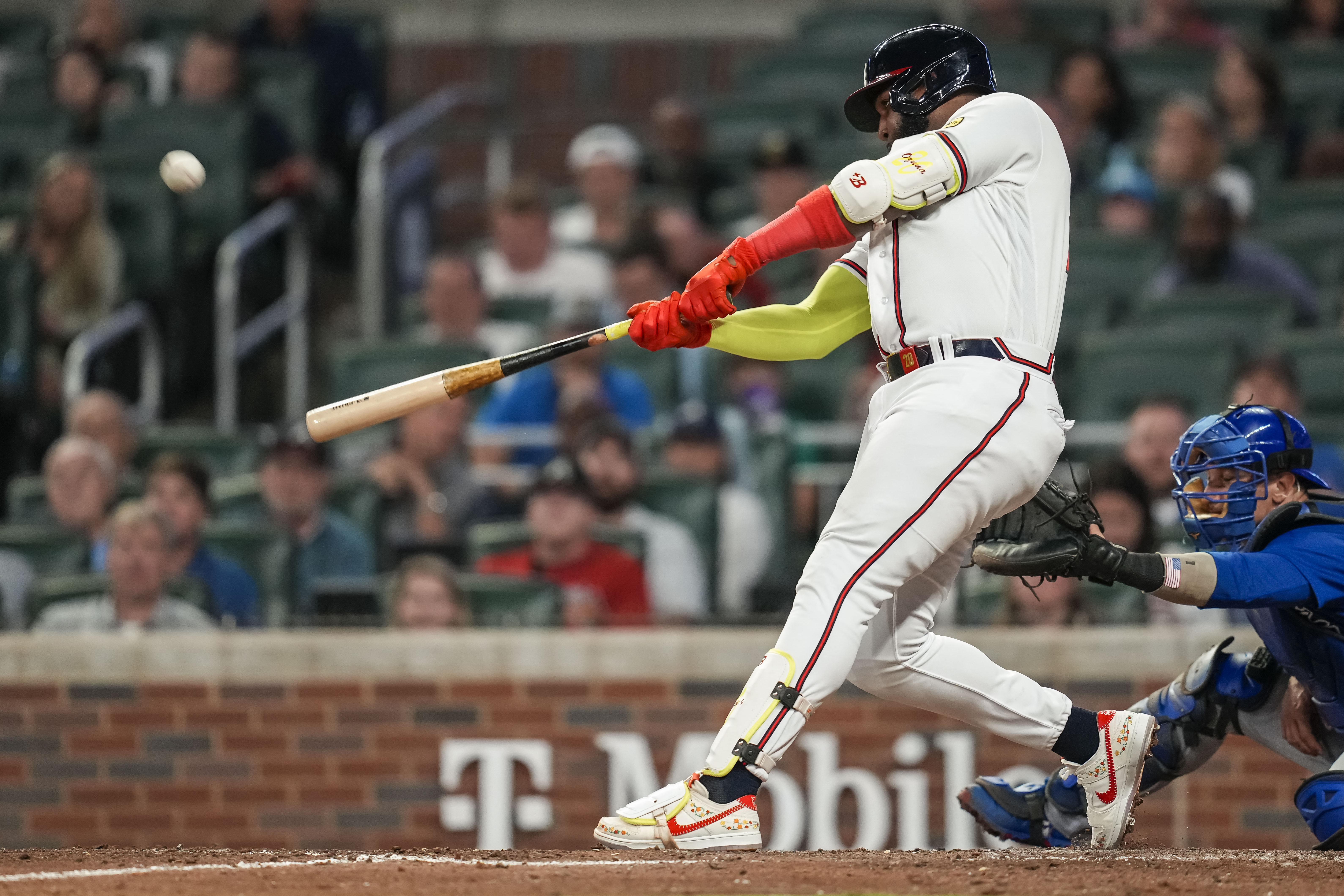 Atlanta Braves' Ronald Acuna Jr. puts on his Nike batting gloves