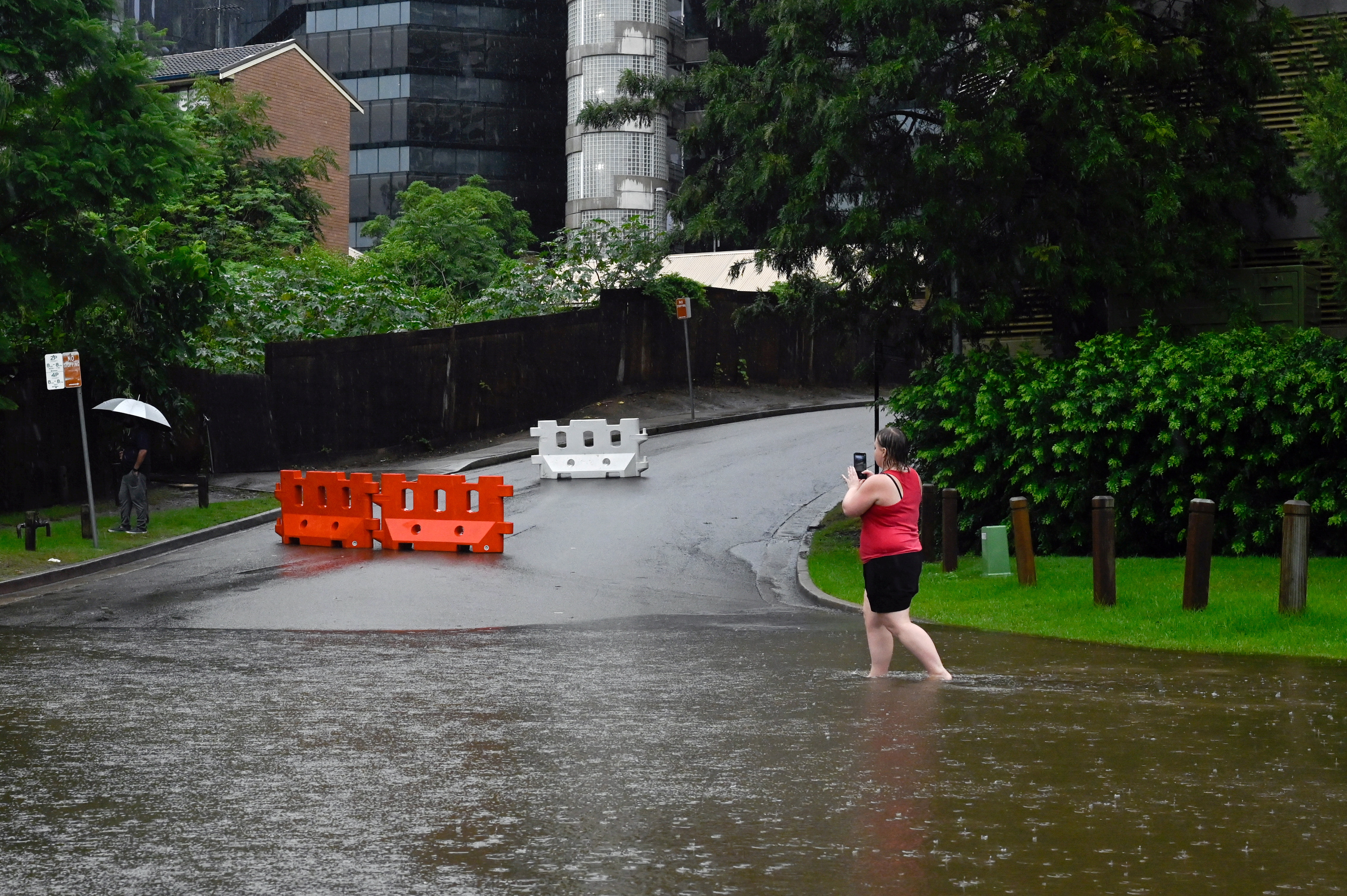 A swollen river is seen as the state of New South Wales experiences heavy rains in Sydney