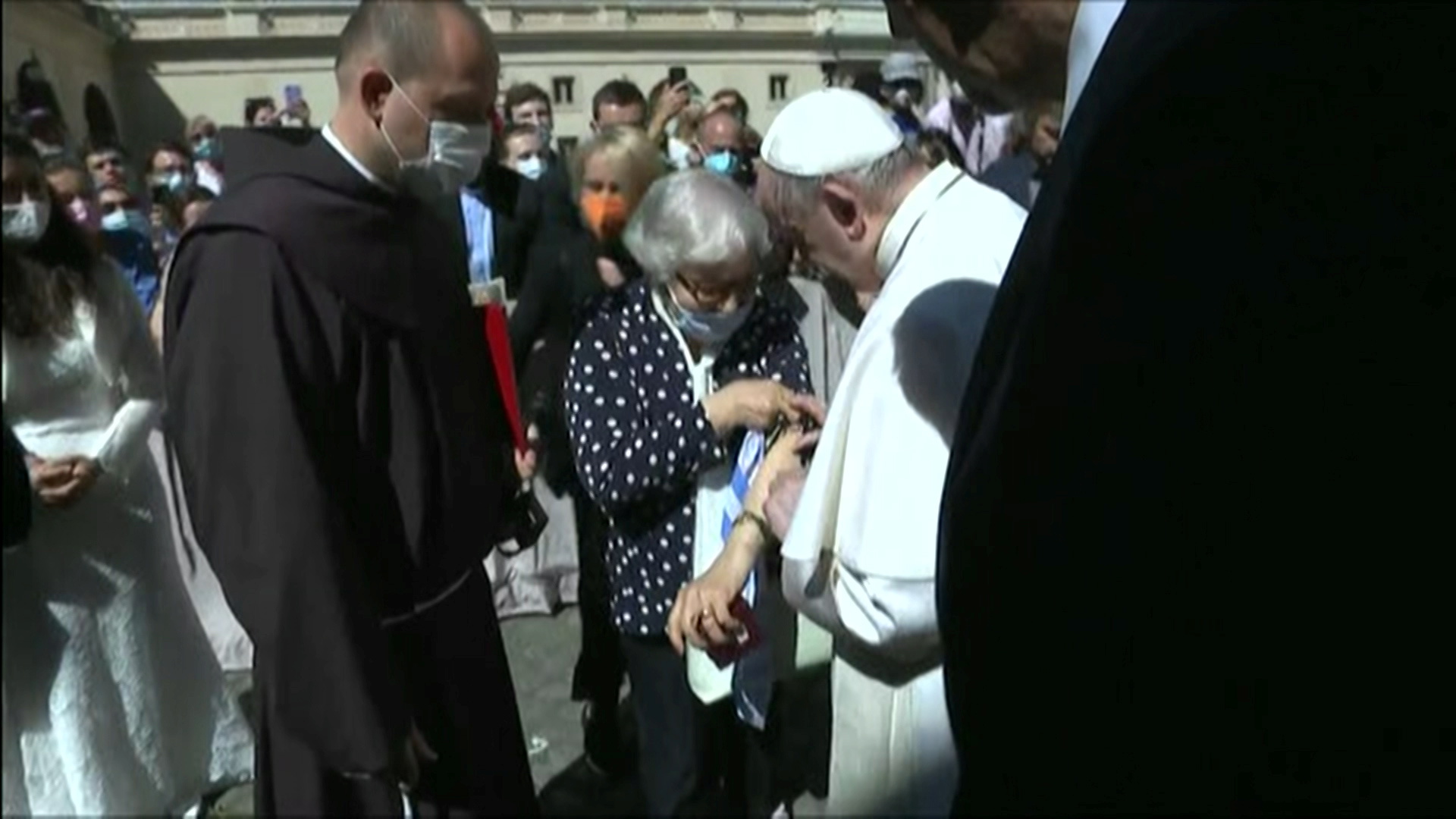 Pope meets Holocaust survivor, kisses concentration camp number tattooed on her arm