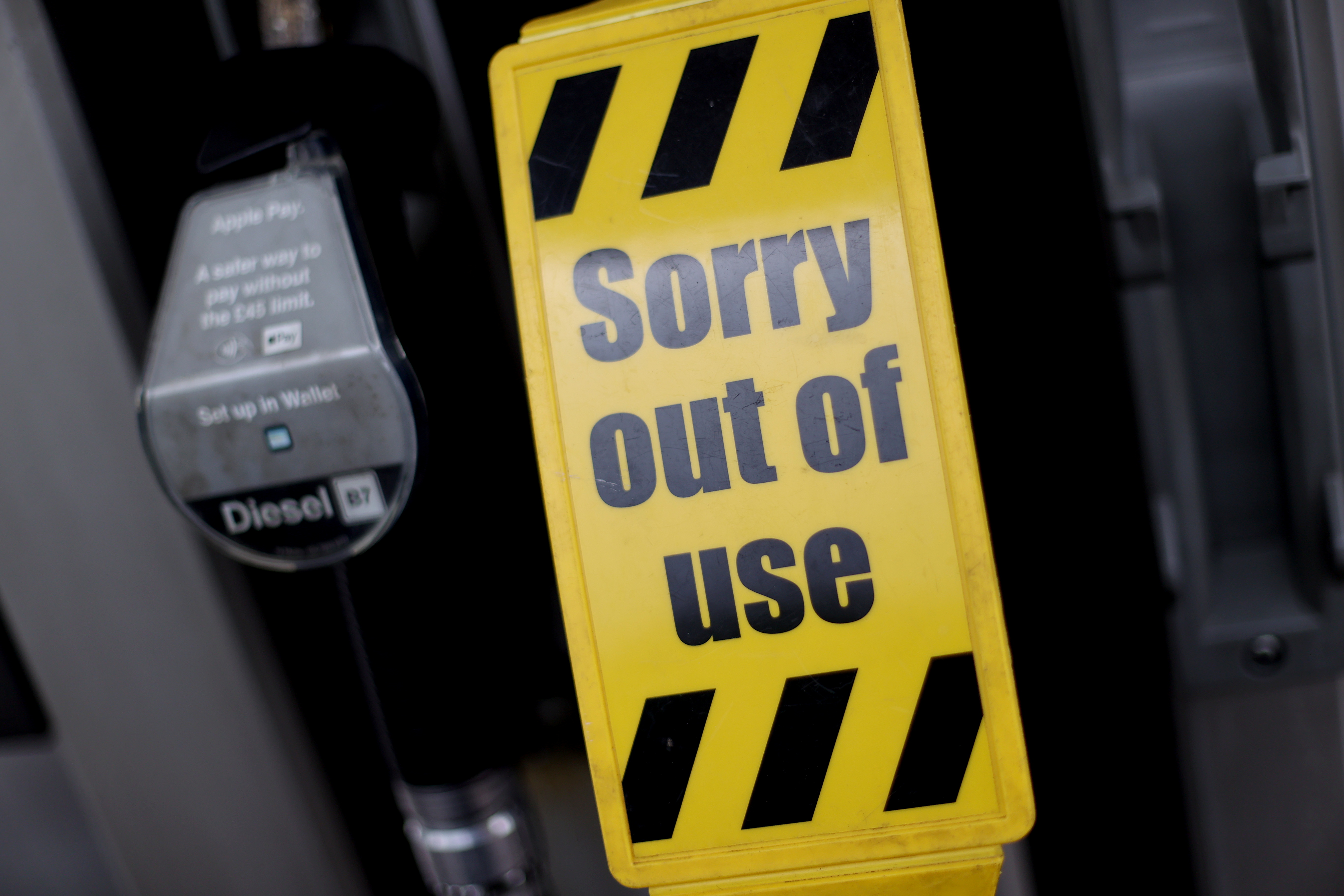 Signs show that unleaded petrol has run out at a fuel station, in Newcastle-under-Lyme