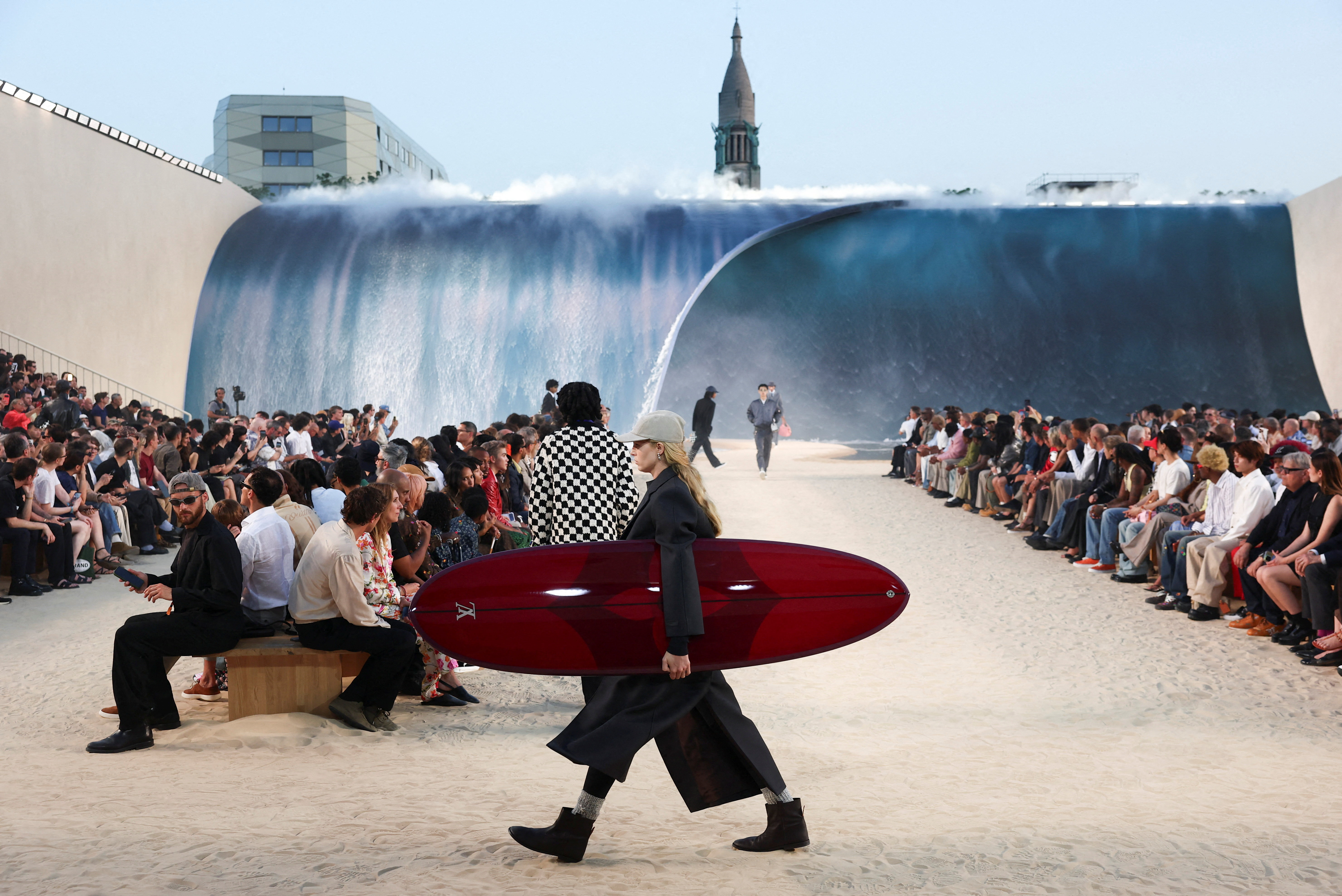 With 30-foot wave, Pharrell dips into California surf style for