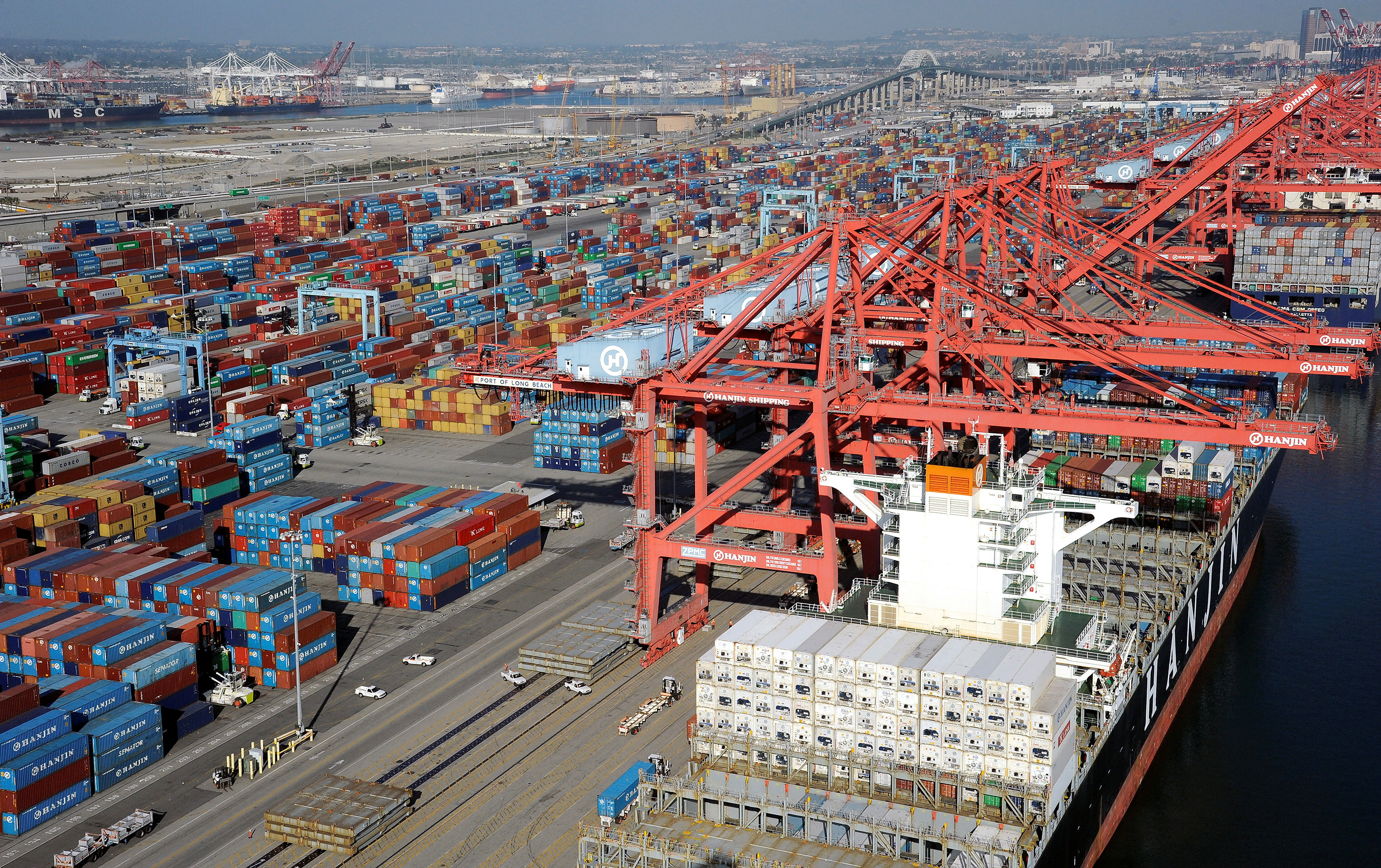 Cranes and containers are seen at the Ports of Los Angeles and Long Beach, California in this aerial image