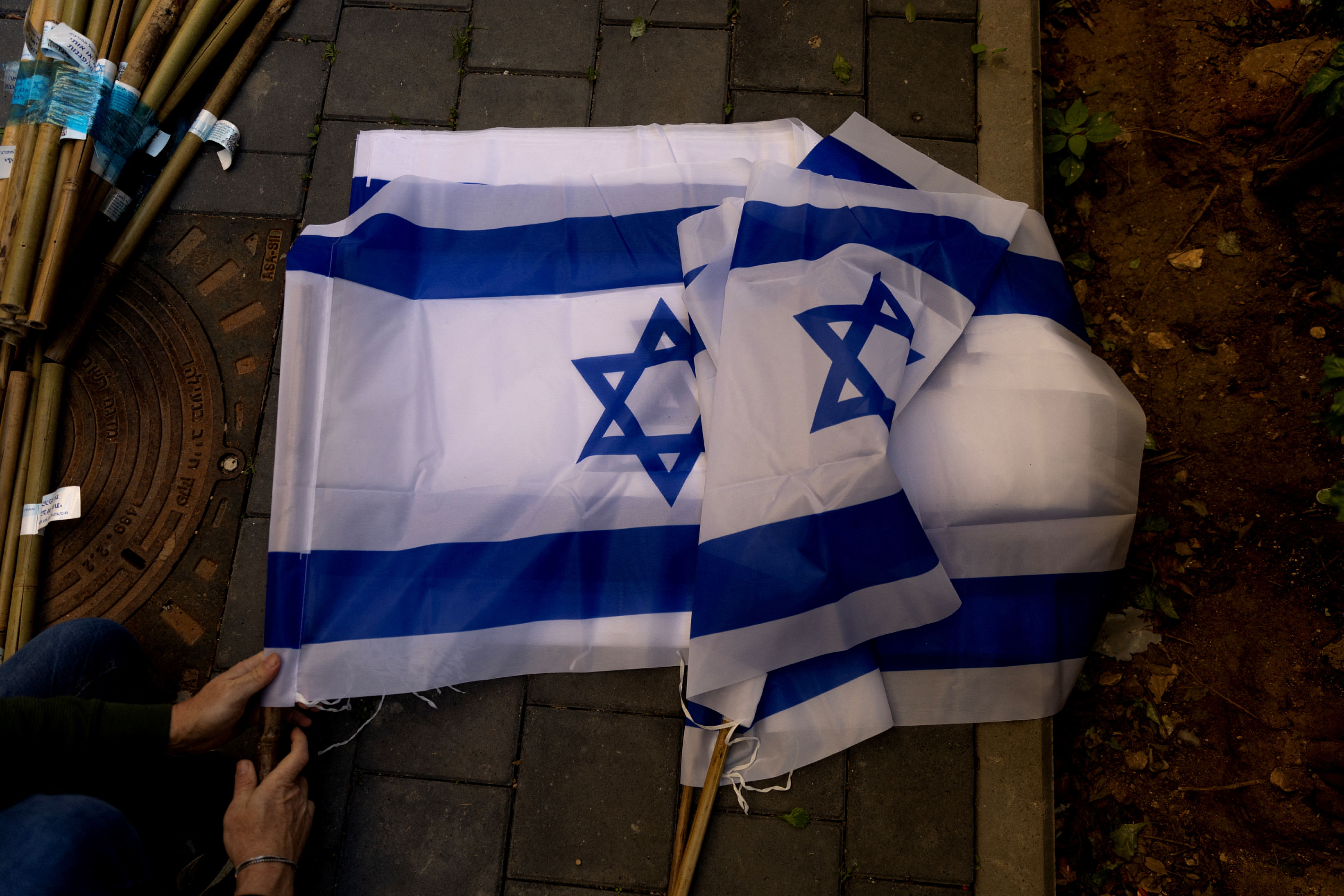 Volunteers work behind the scenes to prepare for Tel Aviv's mass protests