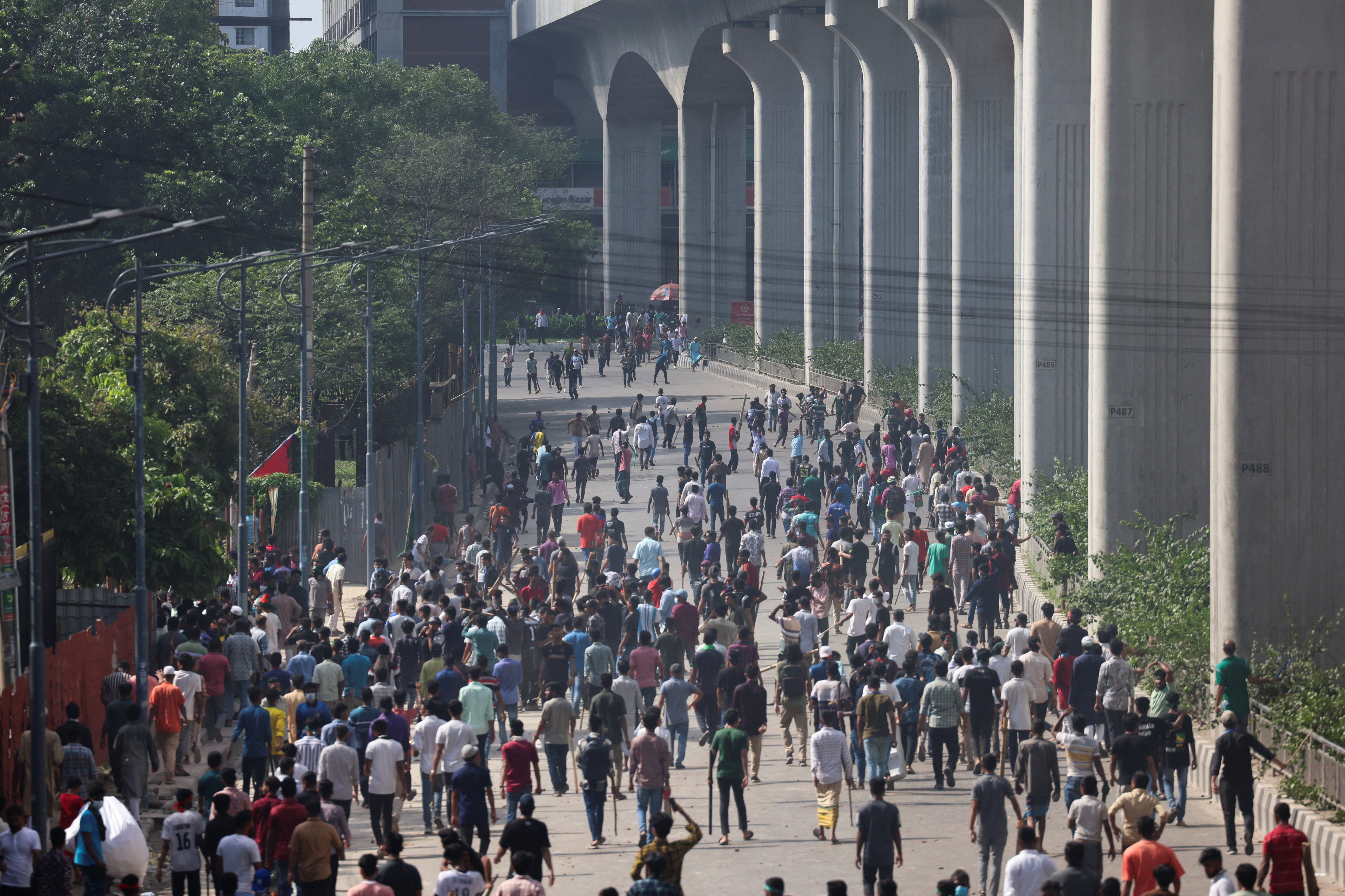 Protesters clash with police and the pro-government supporters, after anti-quota protester demanding the stepping down of the Bangladeshi PM Hasina