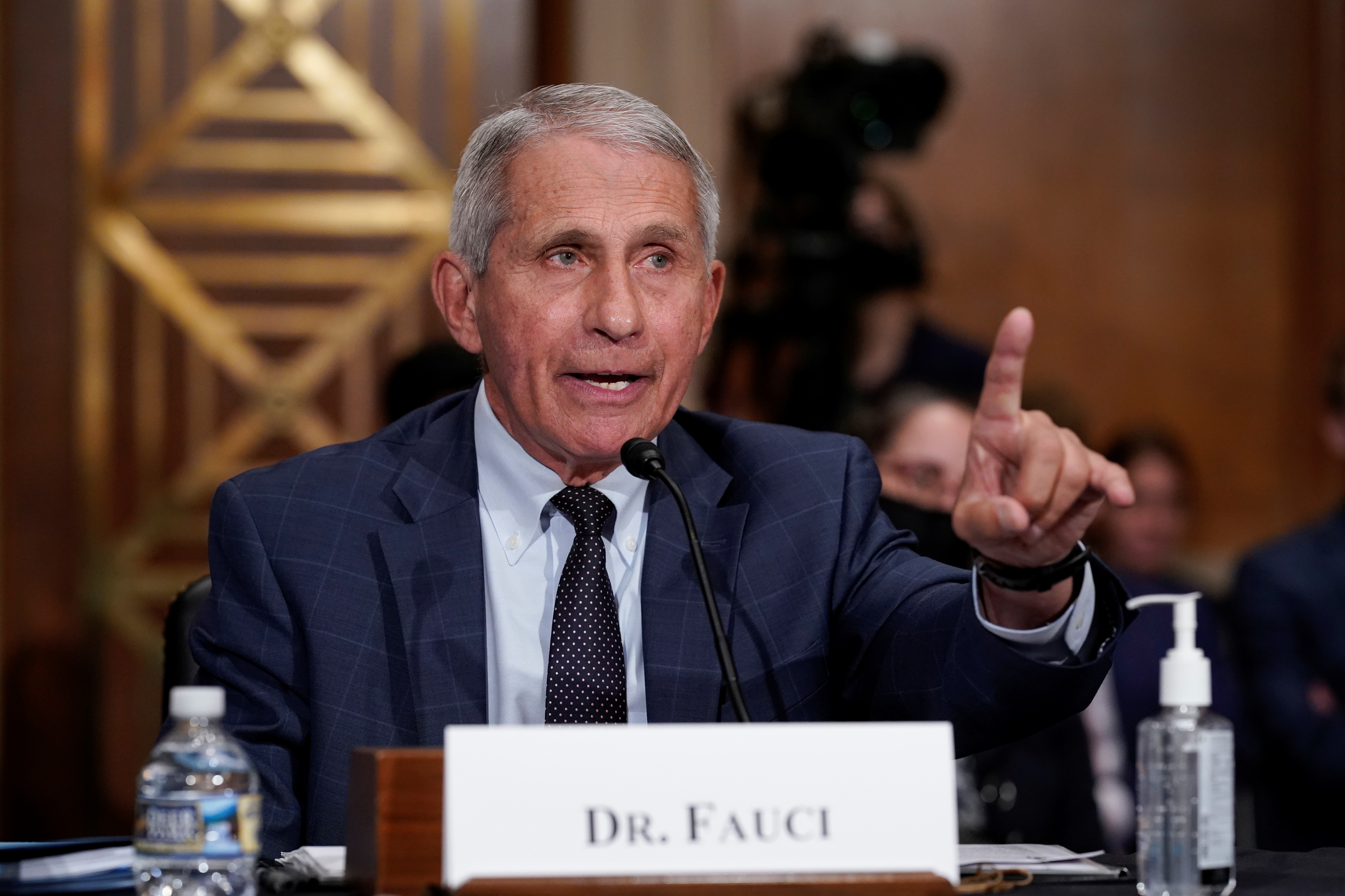 Top infectious disease expert Dr. Anthony Fauci responds to accusations by Sen. Rand Paul (R-KY) as he testifies before the Senate Health, Education, Labor, and Pensions Committee on Capitol hill in Washington, D.C., U.S., July 20, 2021.  J. Scott Applewhite/Pool via REUTERS