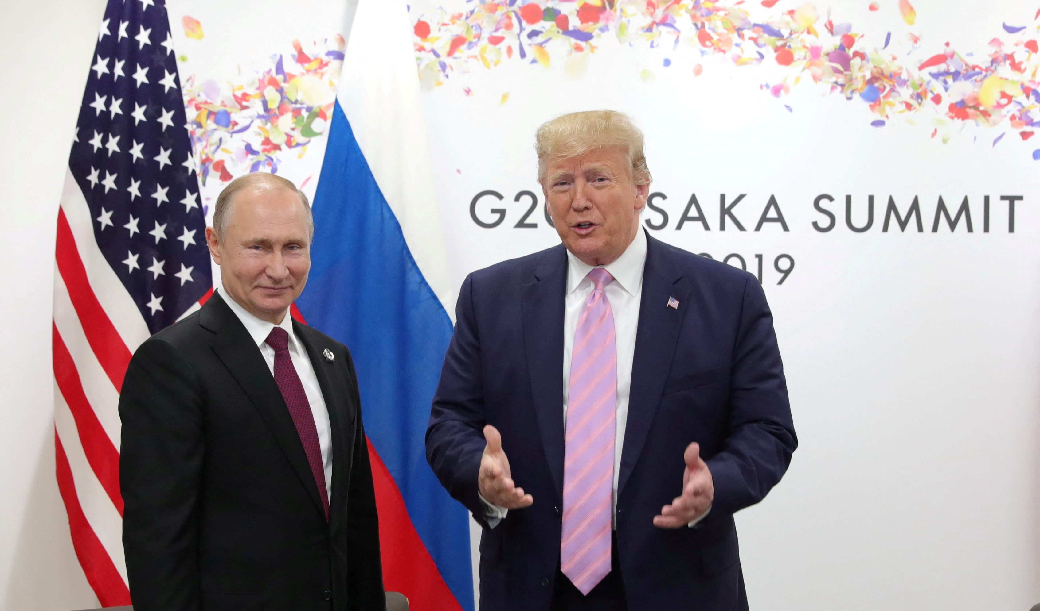 Russia's President Vladimir Putin and U.S. President Donald Trump attend a meeting on the sidelines of the G20 summit in Osaka