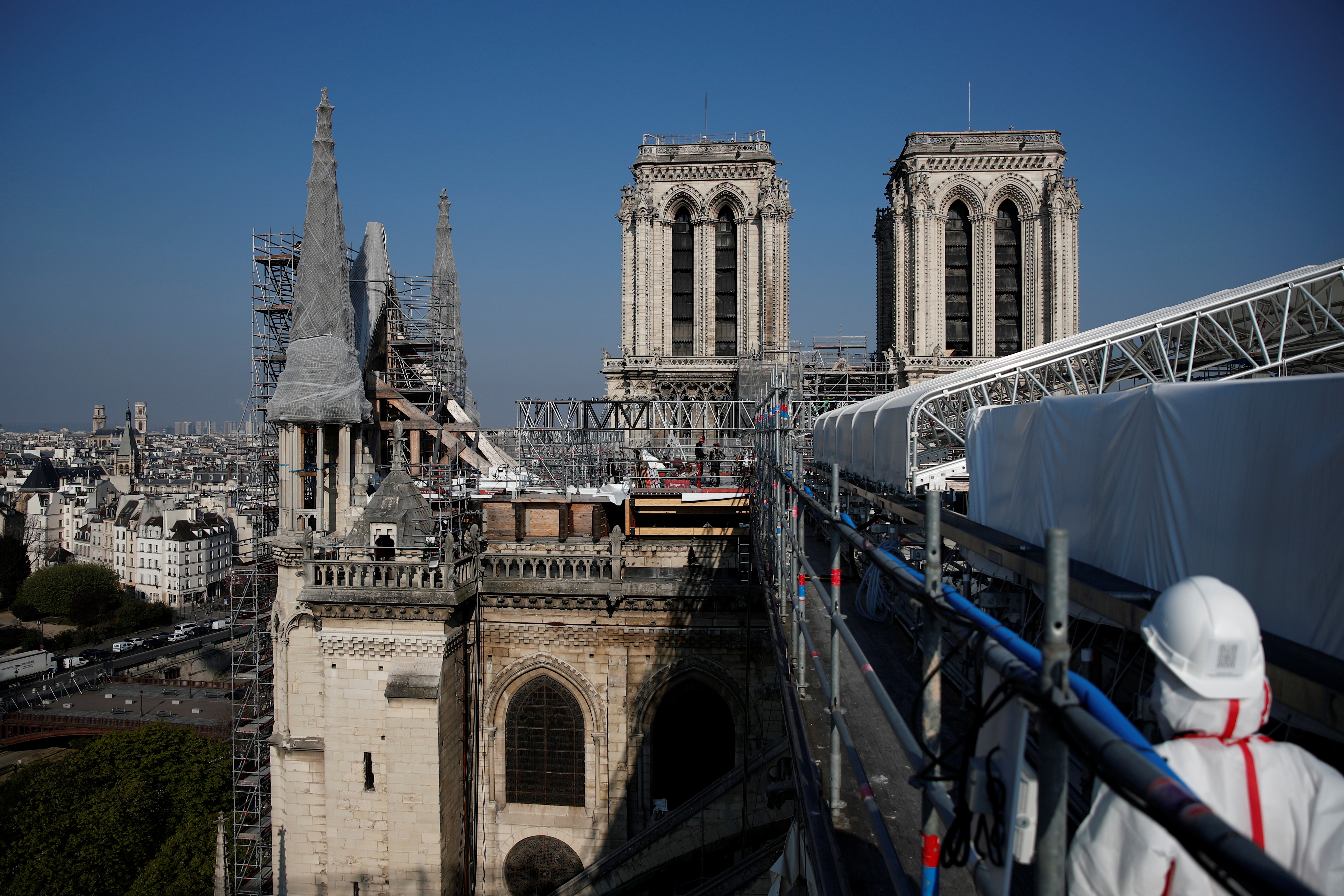 View of the reconstruction site of the roof of the Notre-Dame de Paris Cathedral, which was damaged in a devastating fire two years ago, as restoration works continue, in Paris, France, April 15, 2021. REUTERS/Benoit Tessier/Pool