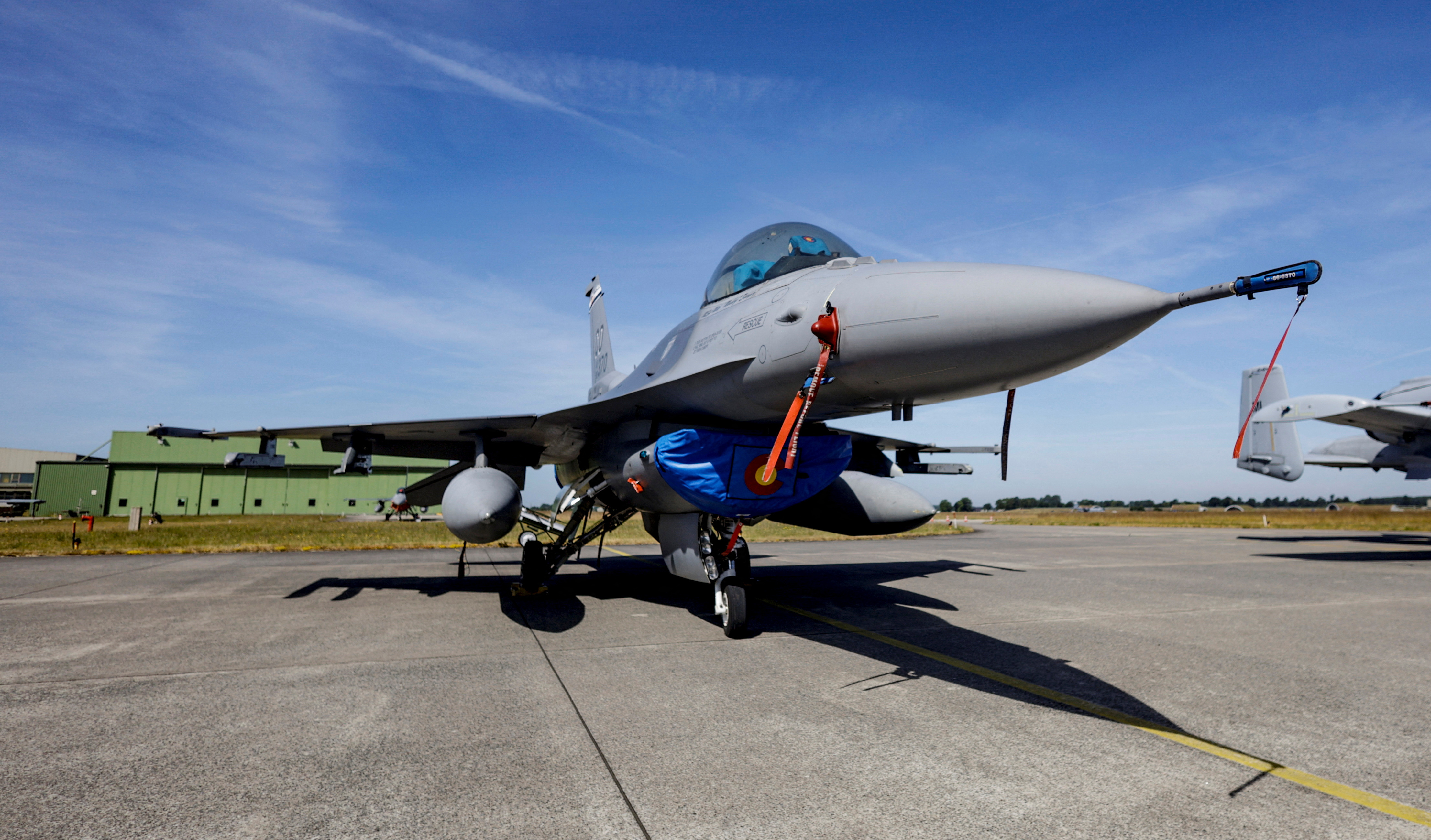 An F-16 combat jet of the US Airforce is prepared for practice flights ahead of the Air Defender Exercise 2023 at the military airport of Jagel