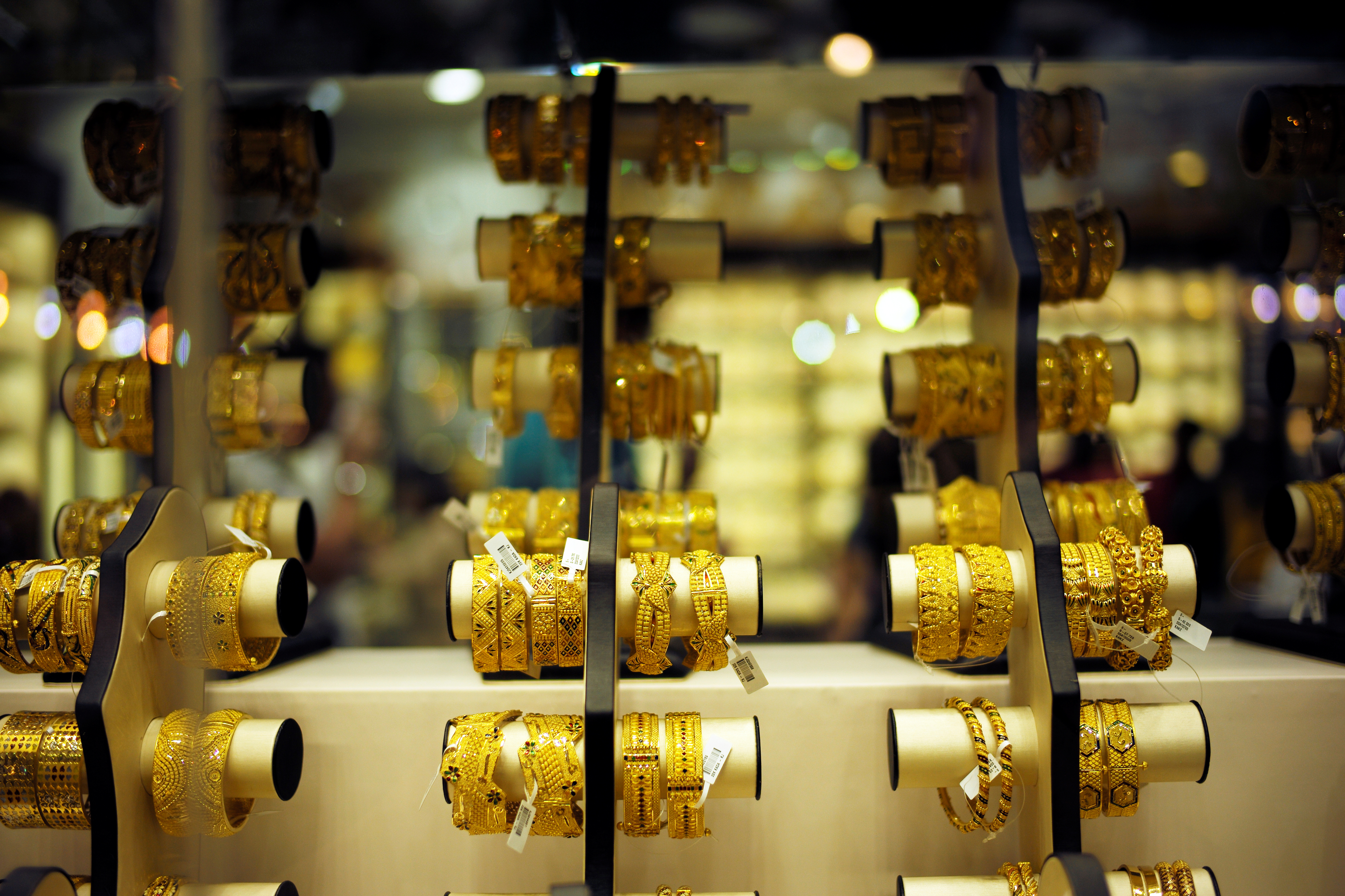 Gold bangles are displayed at a gold shop in Gold Souq in Dubai