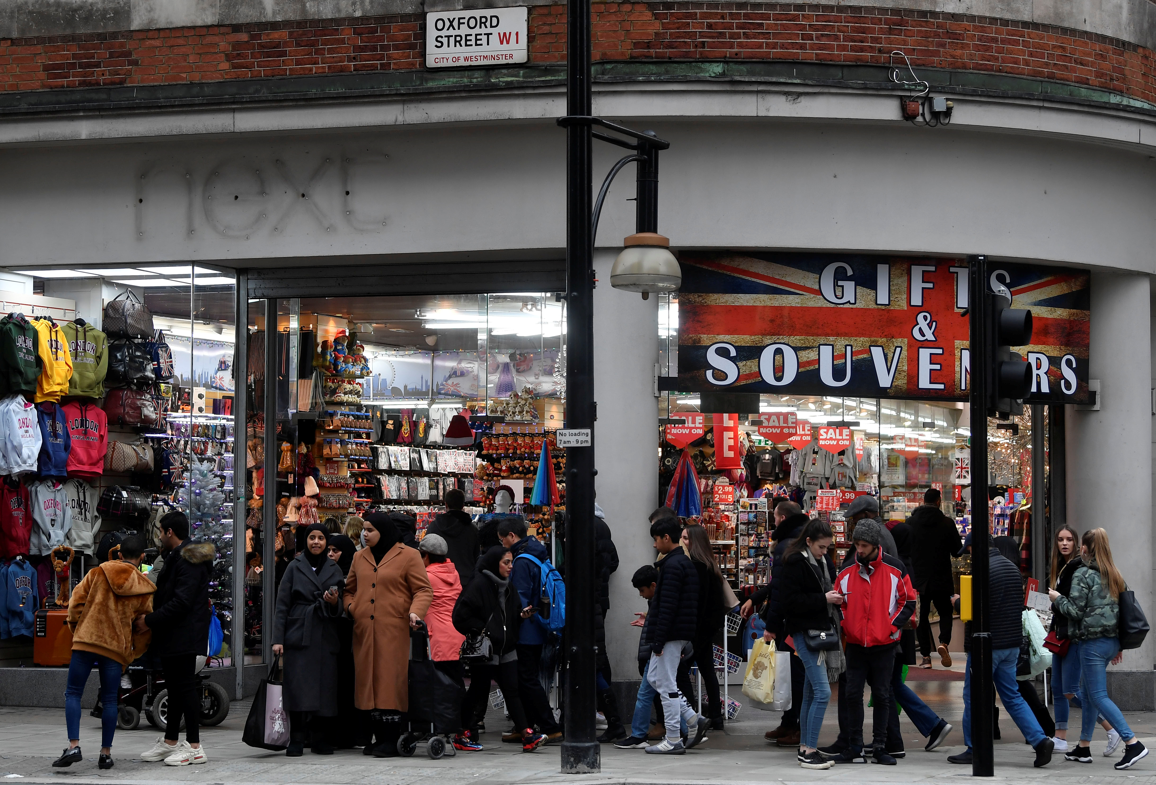Shoppers walk past a former branch of the British clothing retailer Next, now converted into an independent gift shop on Oxford Street in London, Britain, January 3, 2019. REUTERS/Toby Melville