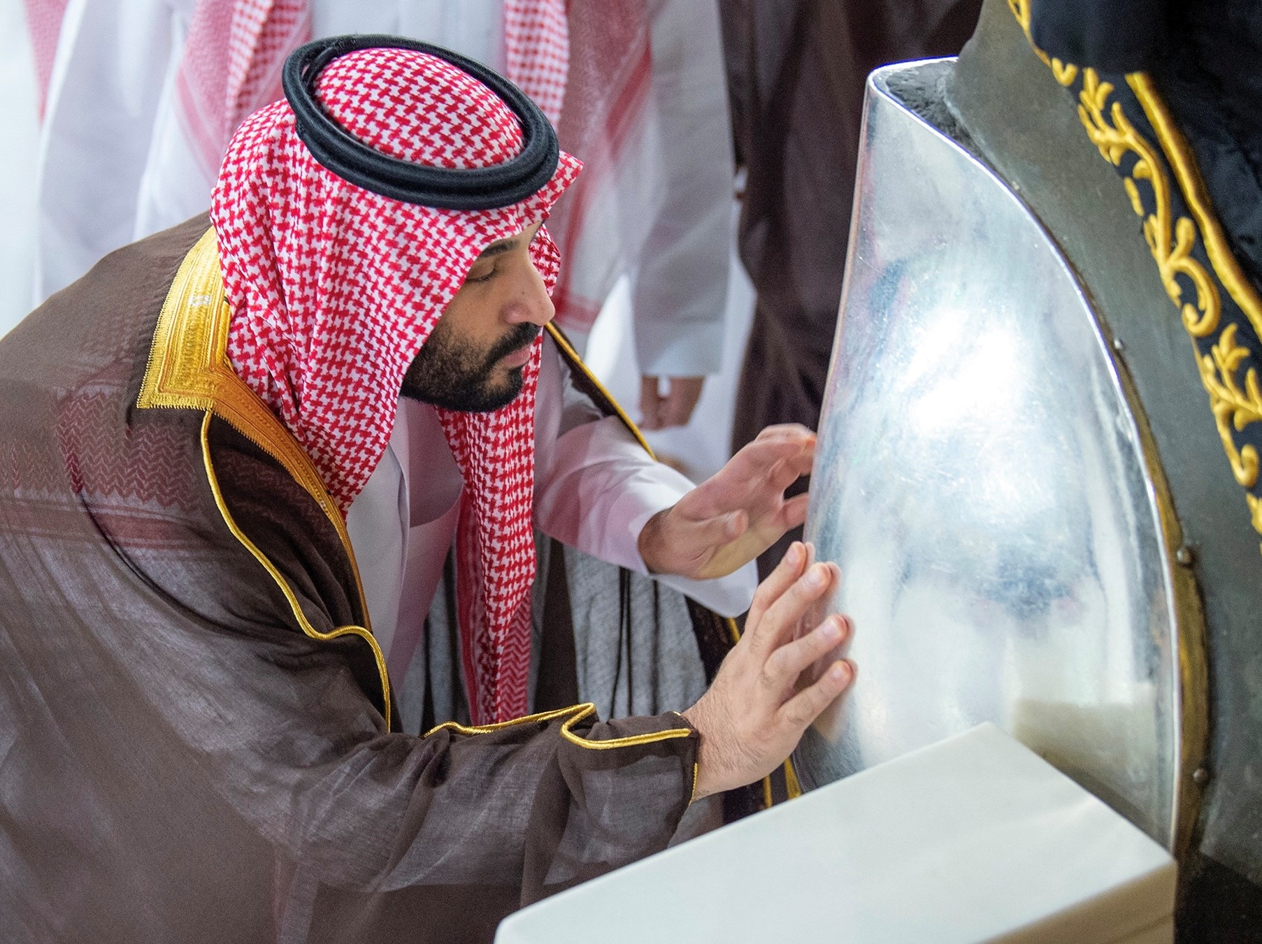 Saudi Crown Prince Mohammed bin Salman washes the Holy Kabaa on behalf of Saudi King Salman bin Abdulaziz, in the Grand Mosque in the Holy City of Mecca, Saudi Arabia