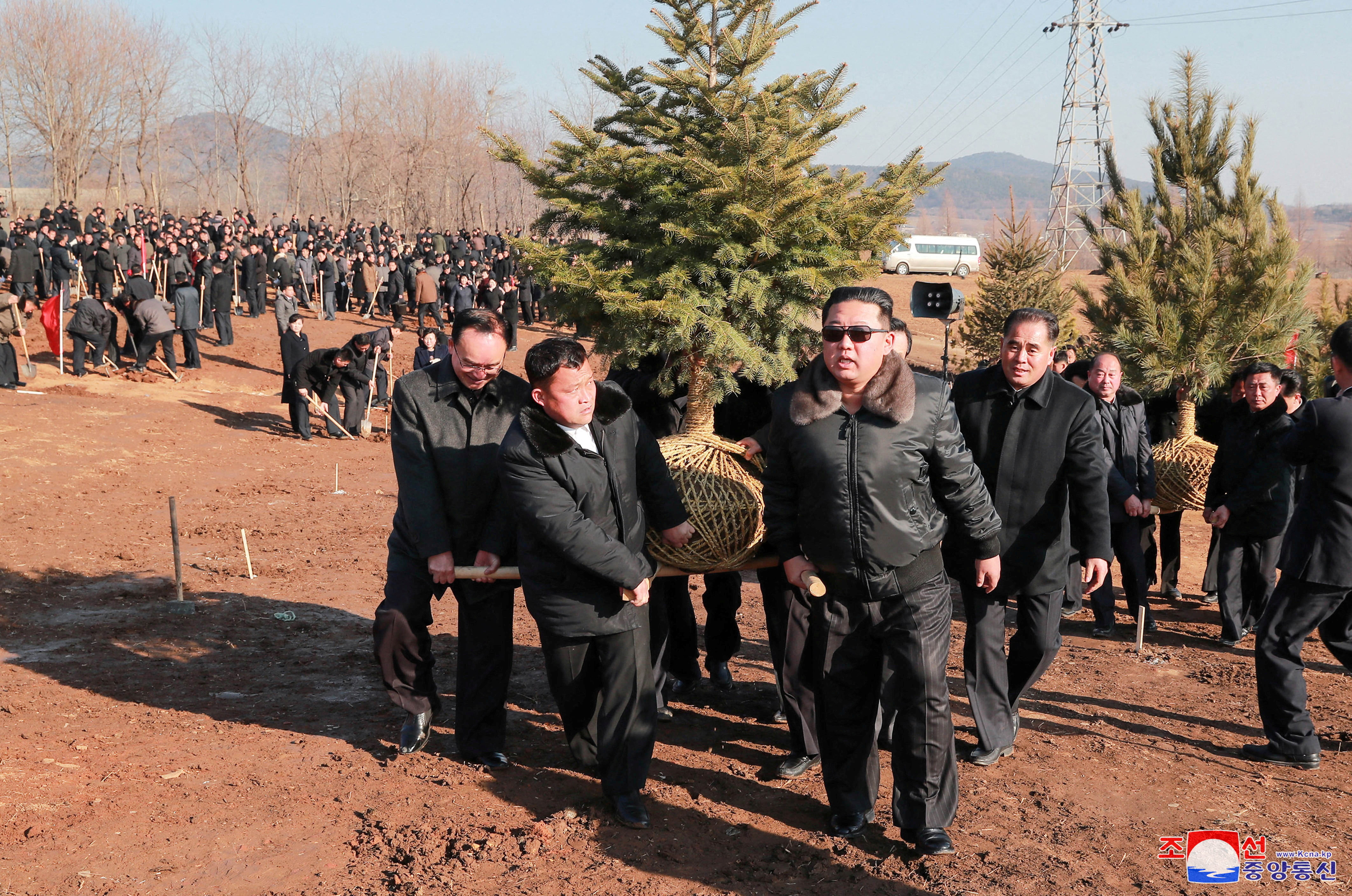 North Korean leader Kim Jong Un takes part in an event to plant trees with the participants of the 2nd Conference of Secretaries of Primary Committees of the Workers' Party of Korea